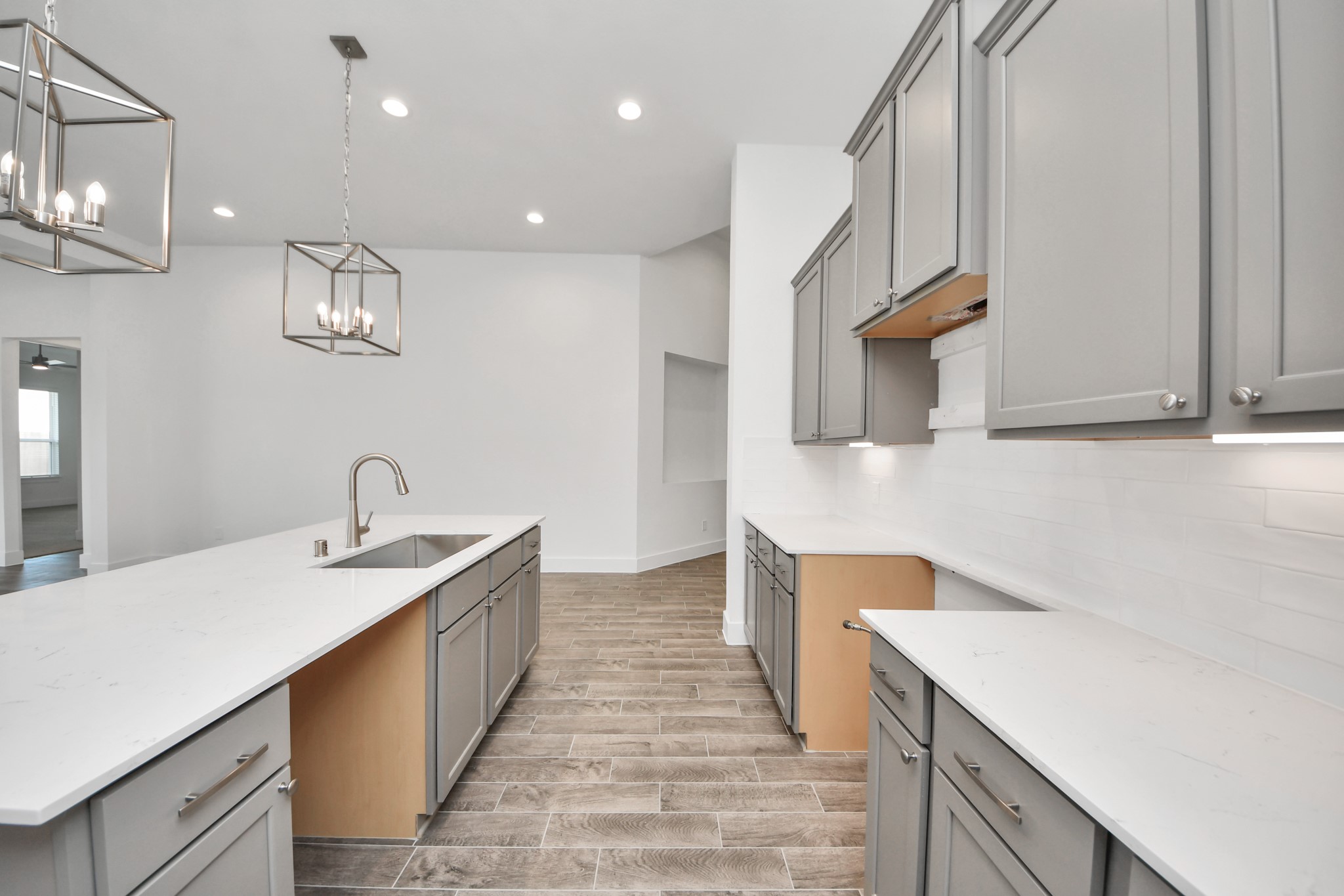 This generously spacious kitchen is a dream realized! Sample photo of completed home with similar floor plan. Actual colors and selections may vary.