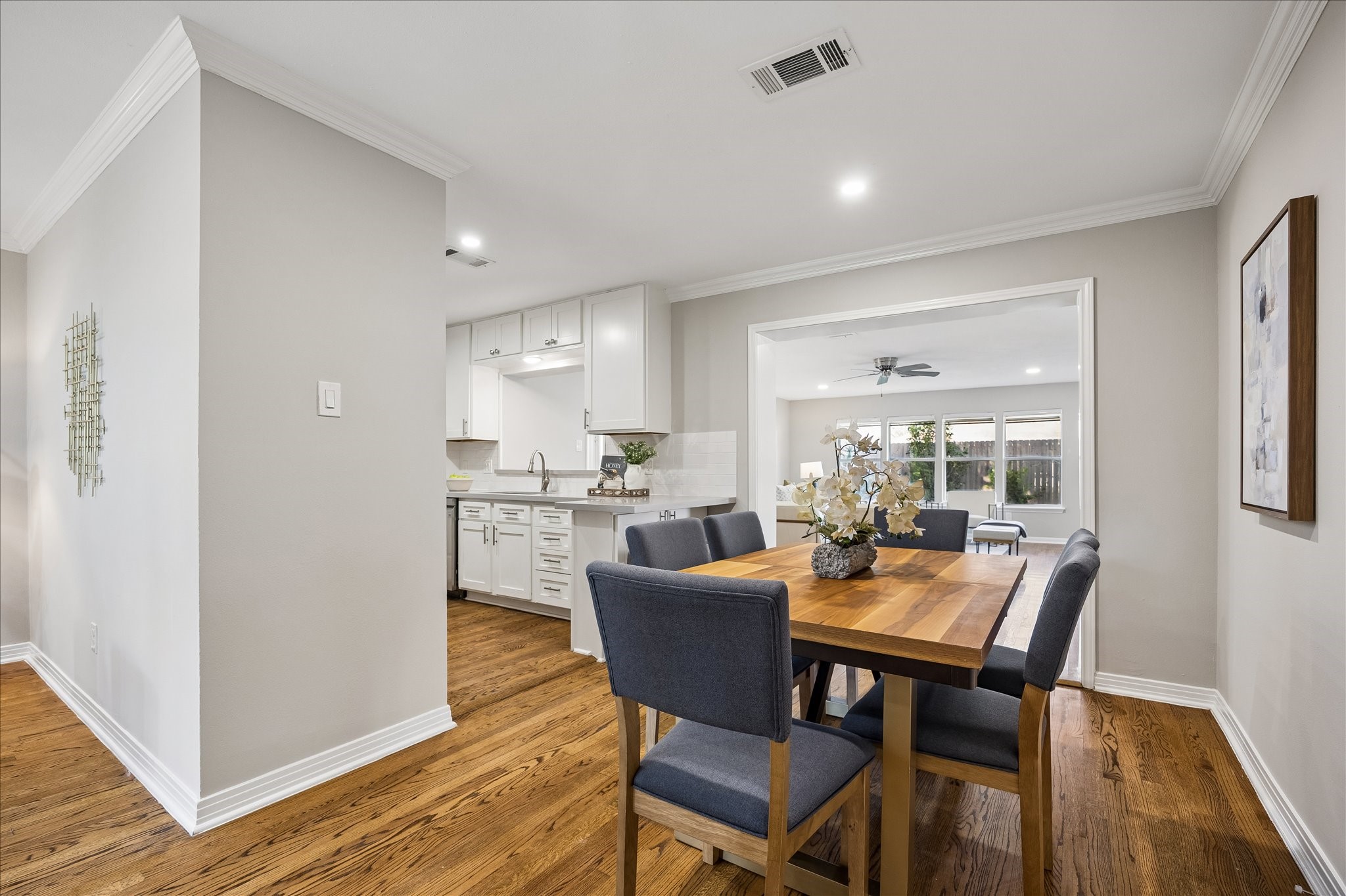 An inviting dining space connects seamlessly to the kitchen and main living areas.