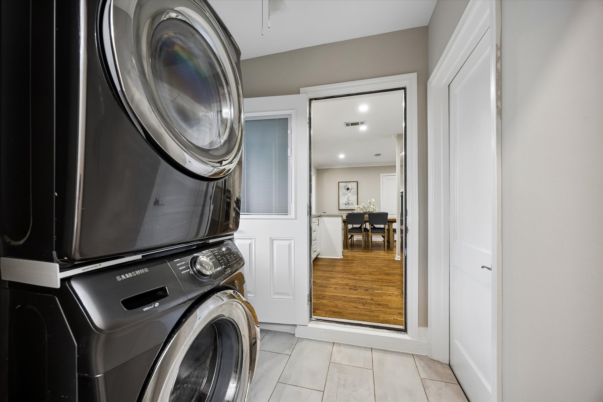 A dedicated laundry room with full-size appliances.