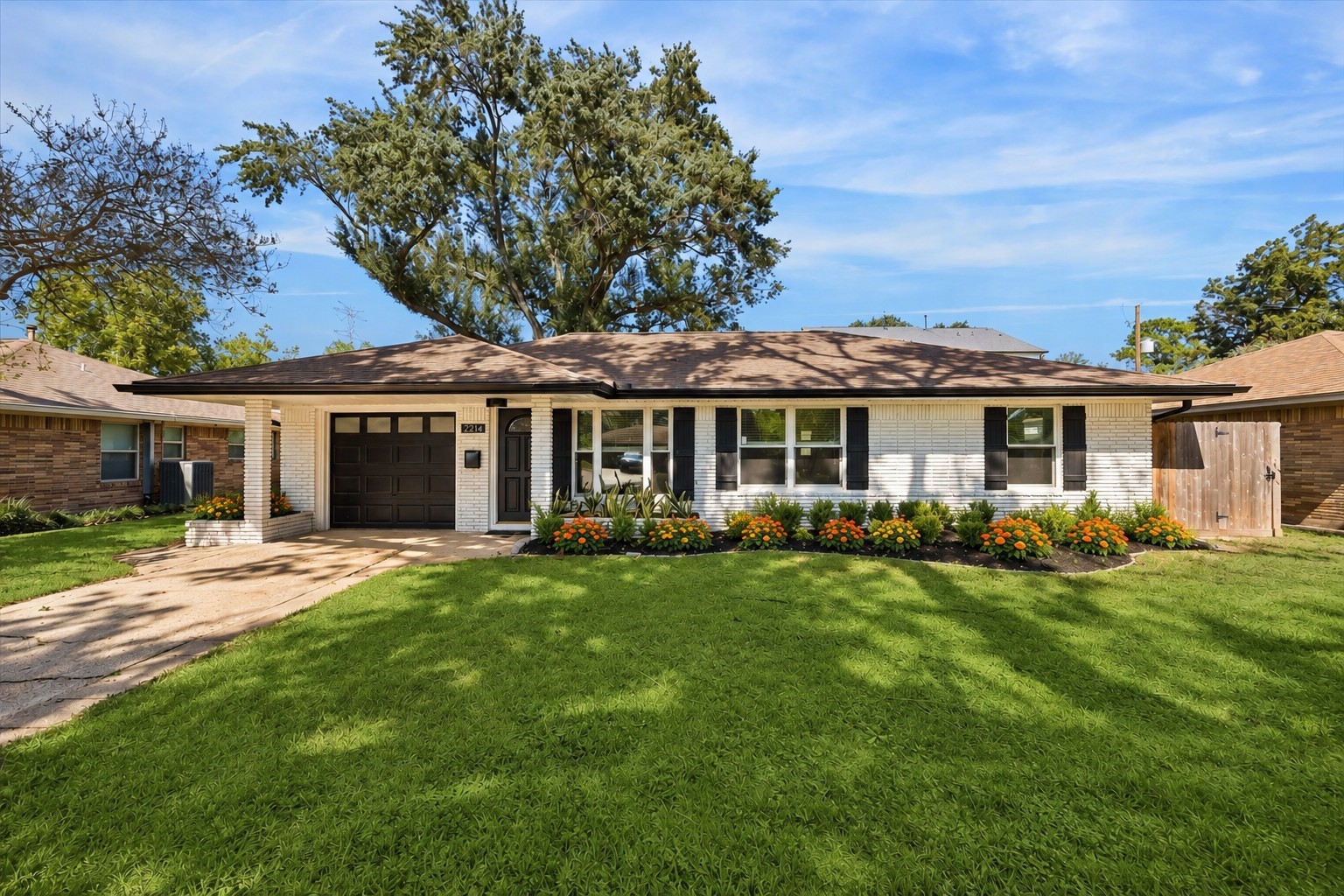 Timeless curb appeal meets modern sophistication in the heart of Shepherd Forest.