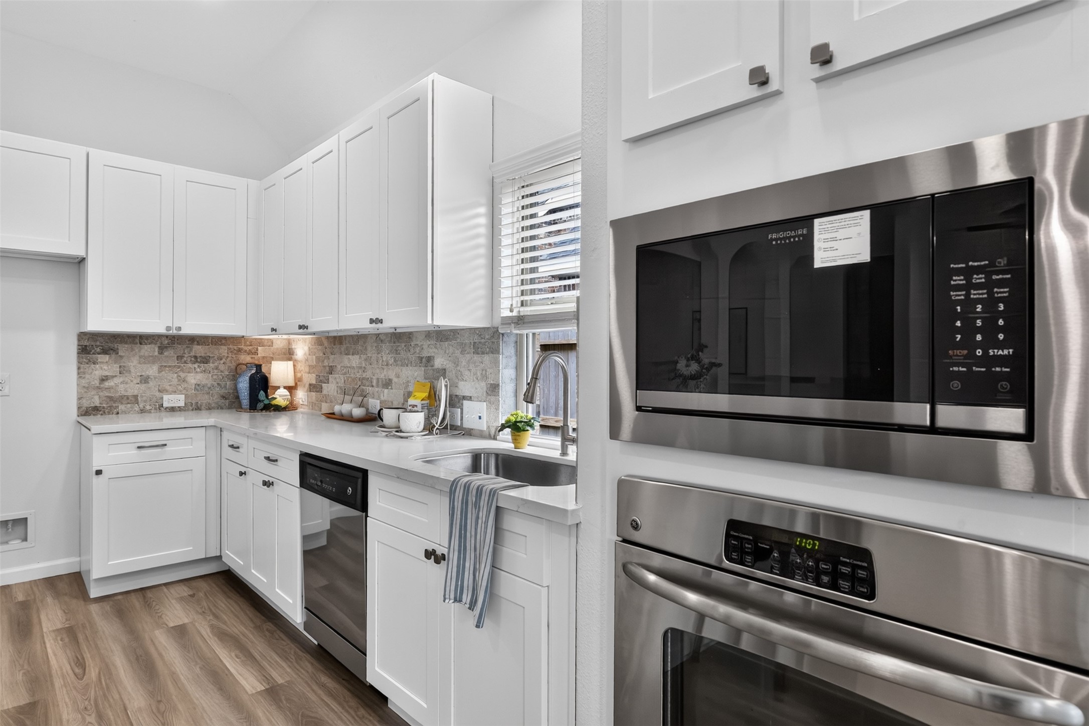 New/updated stainless steel appliances, plus an undermount stainless steel sink with new garbage disposal. All kitchen hardware is also new!