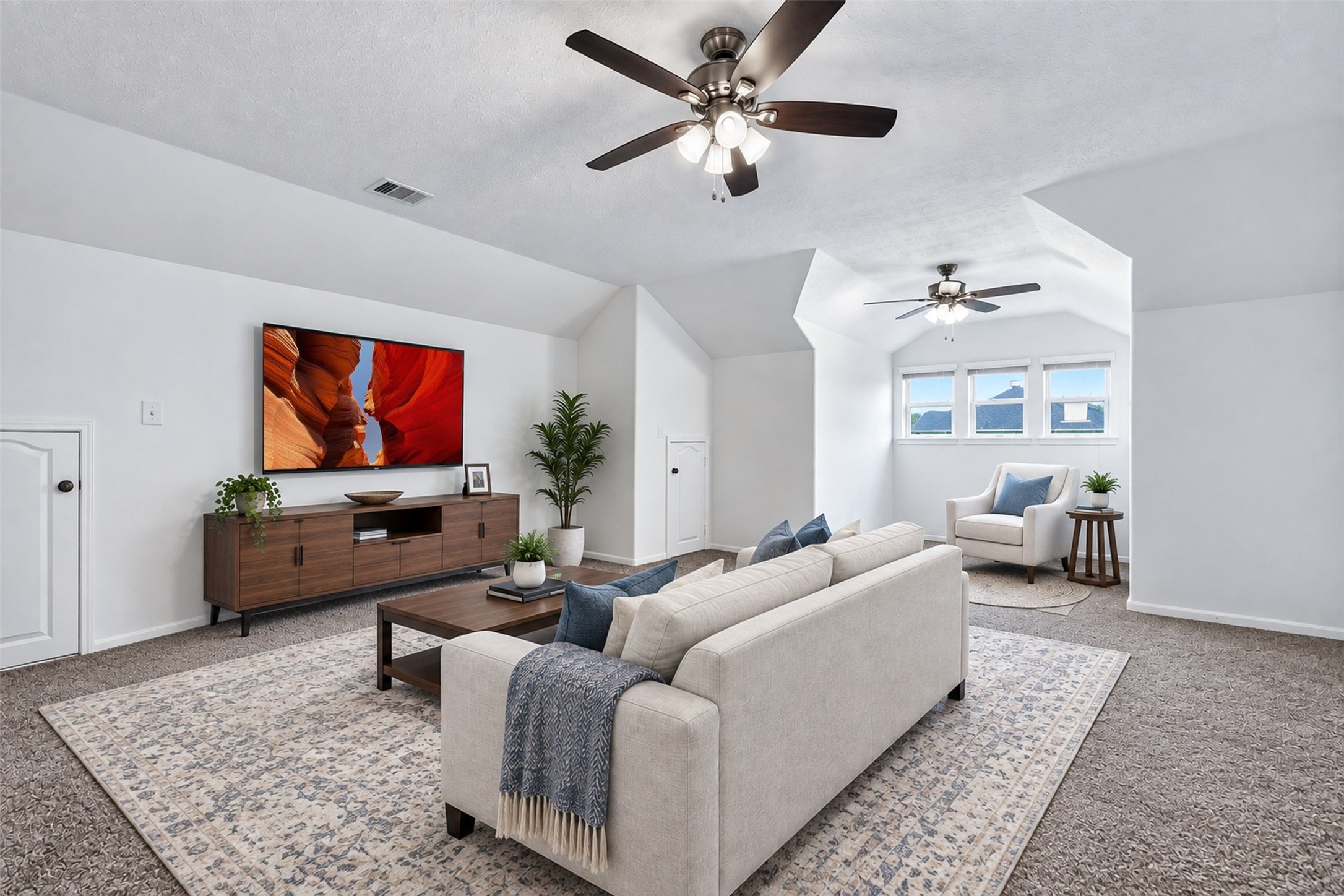 Family Room. [*Photo has been virtually staged to offer design and layout ideas.]
