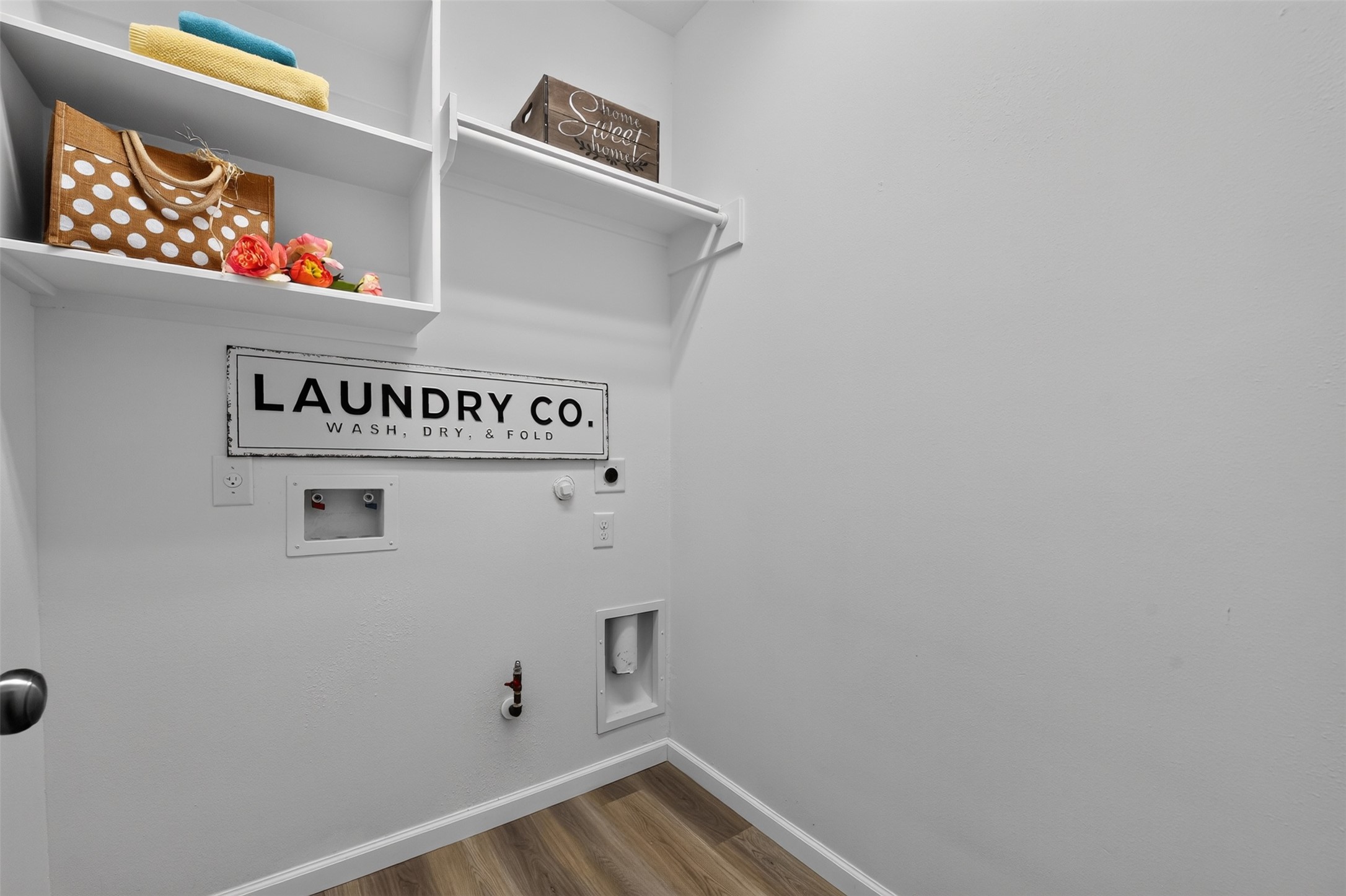 Utility room with built-in shelving.