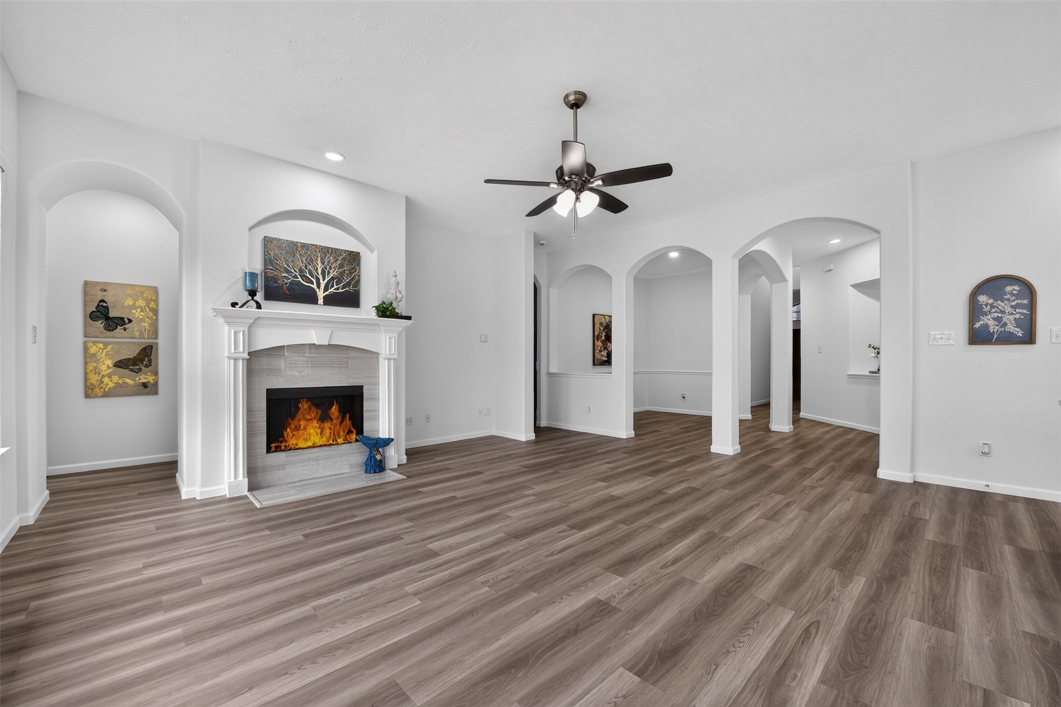 A strategically placed recessed light is ready to accent your fireplace mantel. New recessed lighting throughout home. A strategically placed recessed light is ready to accent your fireplace mantel. New recessed lighting throughout home.