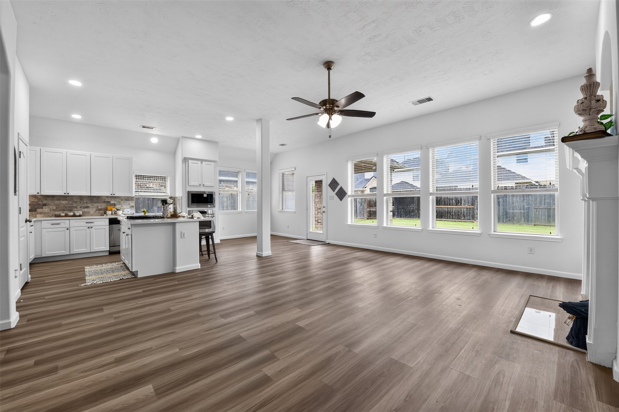 The living room opens nicely to the kitchen and breakfast areas. The living room opens nicely to the kitchen and breakfast areas.
