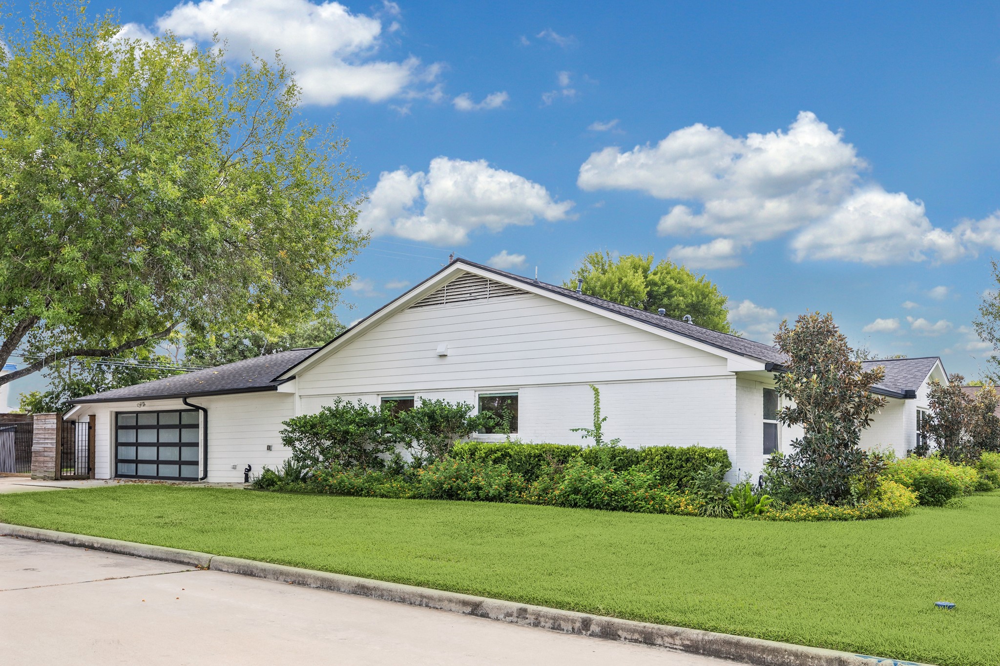 Situated on a desirable corner lot in Briarbend, this beautifully updated home offers exceptional curb appeal with mature trees and manicured landscaping. Its spacious lot, inviting exterior, and convenient location complete this wonderful property.