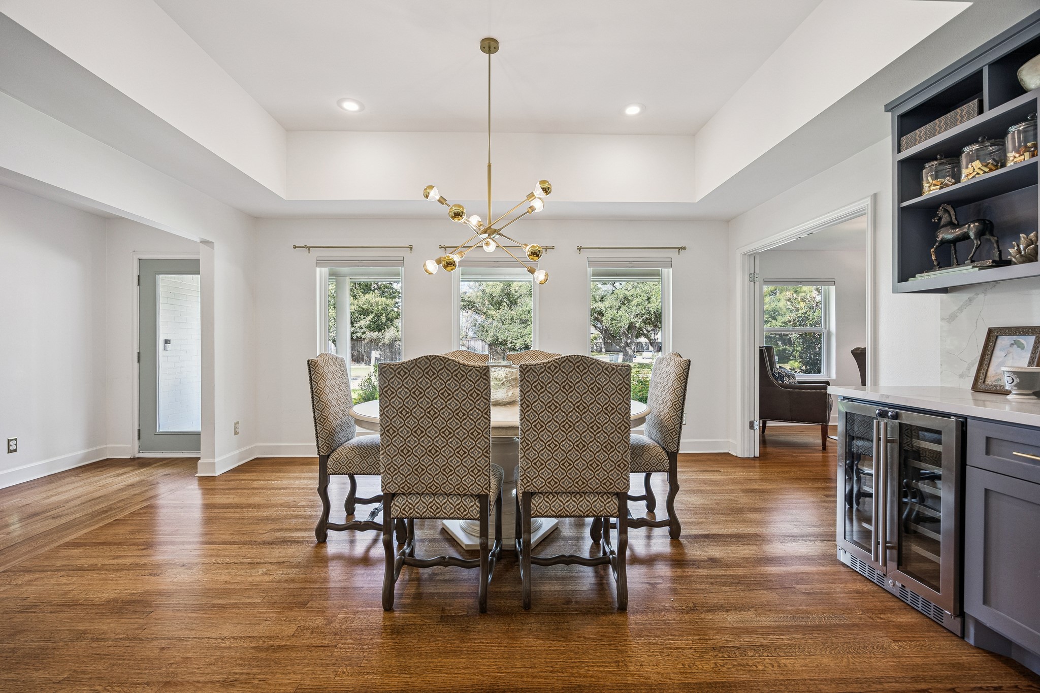 An elegant setting for everyday meals and special gatherings, the dining room offers plenty of space for a large table. Custom built-ins provide additional storage and display space.
