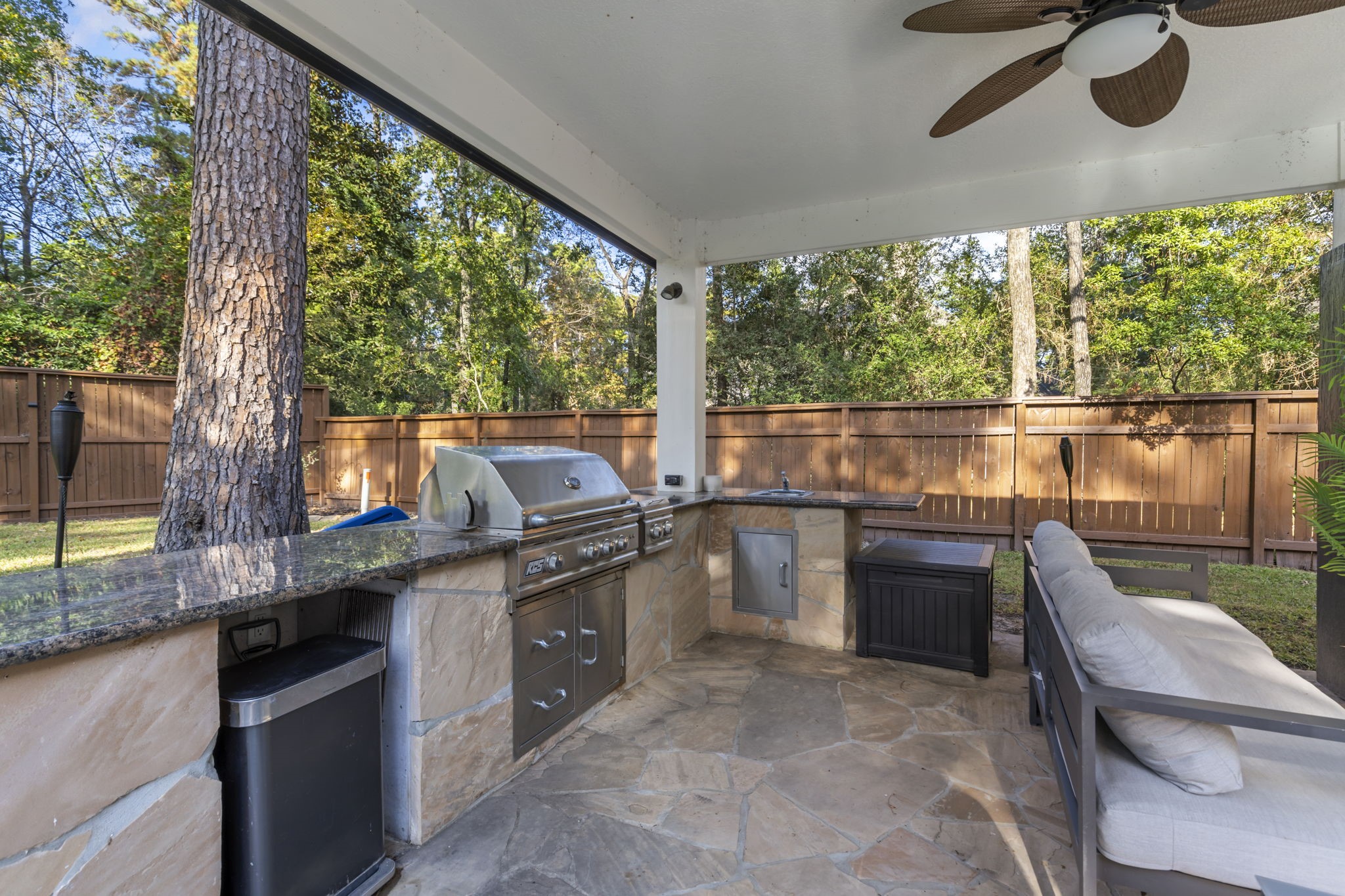 No Texas backyard is complete without a summer kitchen equipped with granite countertops, a gas grill, and cooktop burnersideal for family cookouts and year-round grilling!