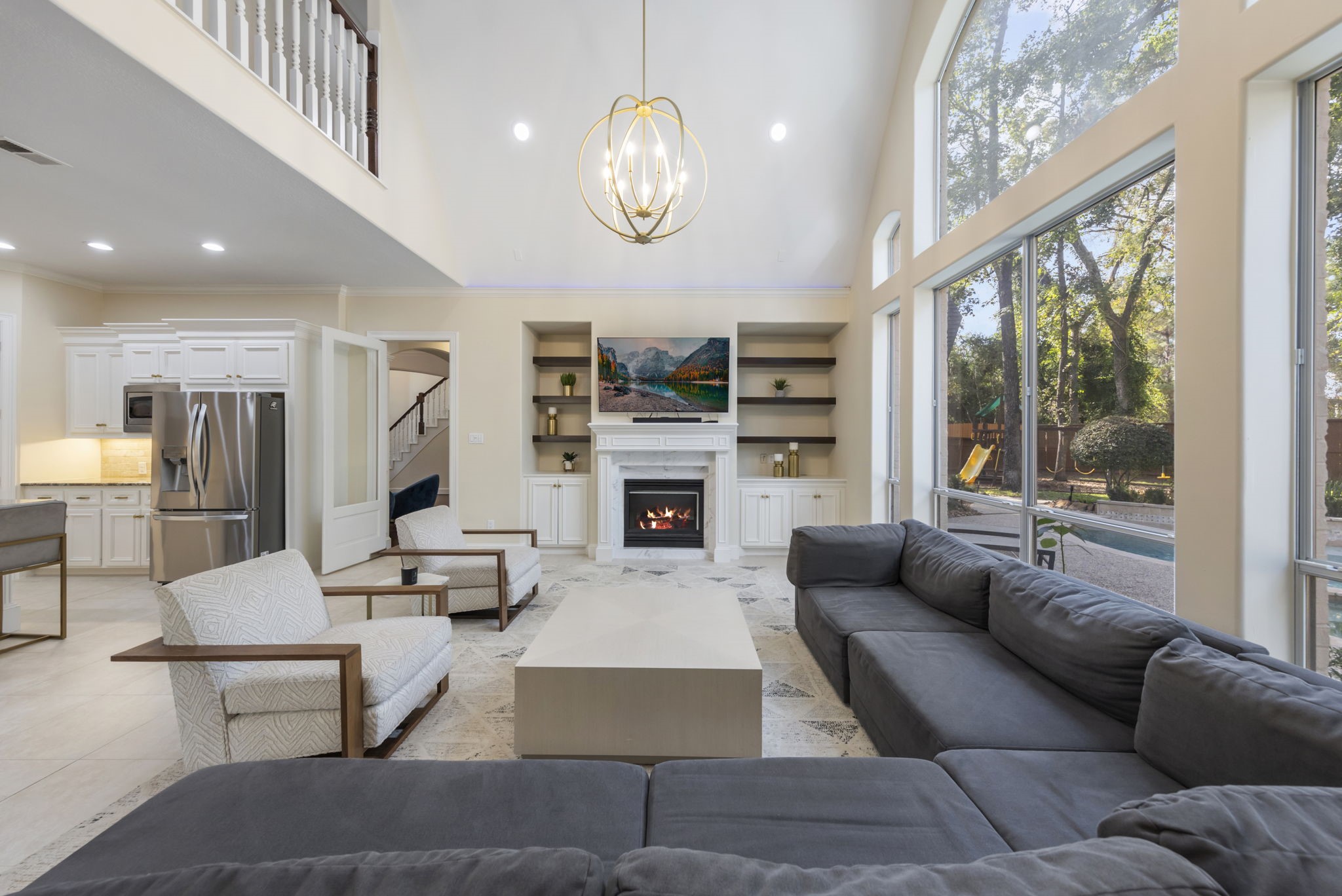 The family room offers a comfortable living space with a seamless transition between the kitchen and casual dining area.