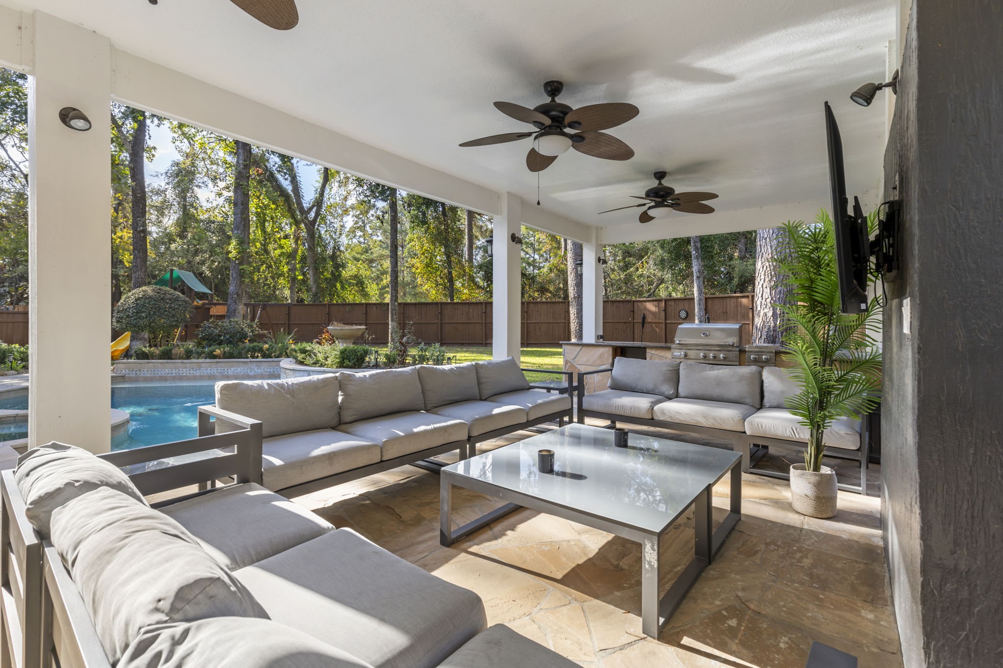 Enjoy the comforts of the extended, covered, back patio, complete with multiple fans that will keep you cool throughout the year!