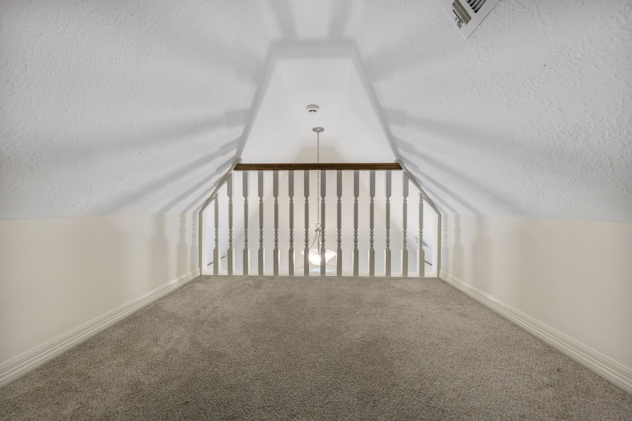 View from inside the loft, with balcony overlooking family room!