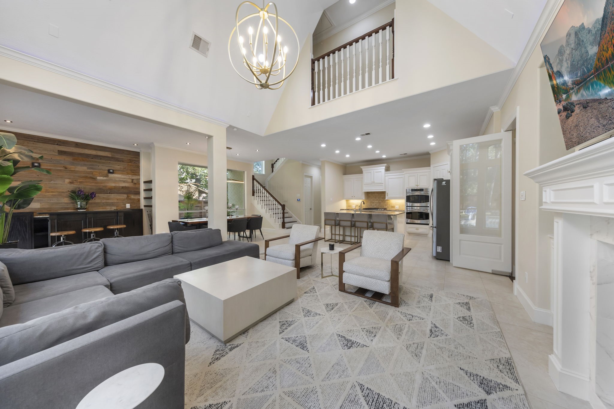 The open-concept living space is perfect for gathering with family and friends, whether sharing a meal or hosting during the holidays.
