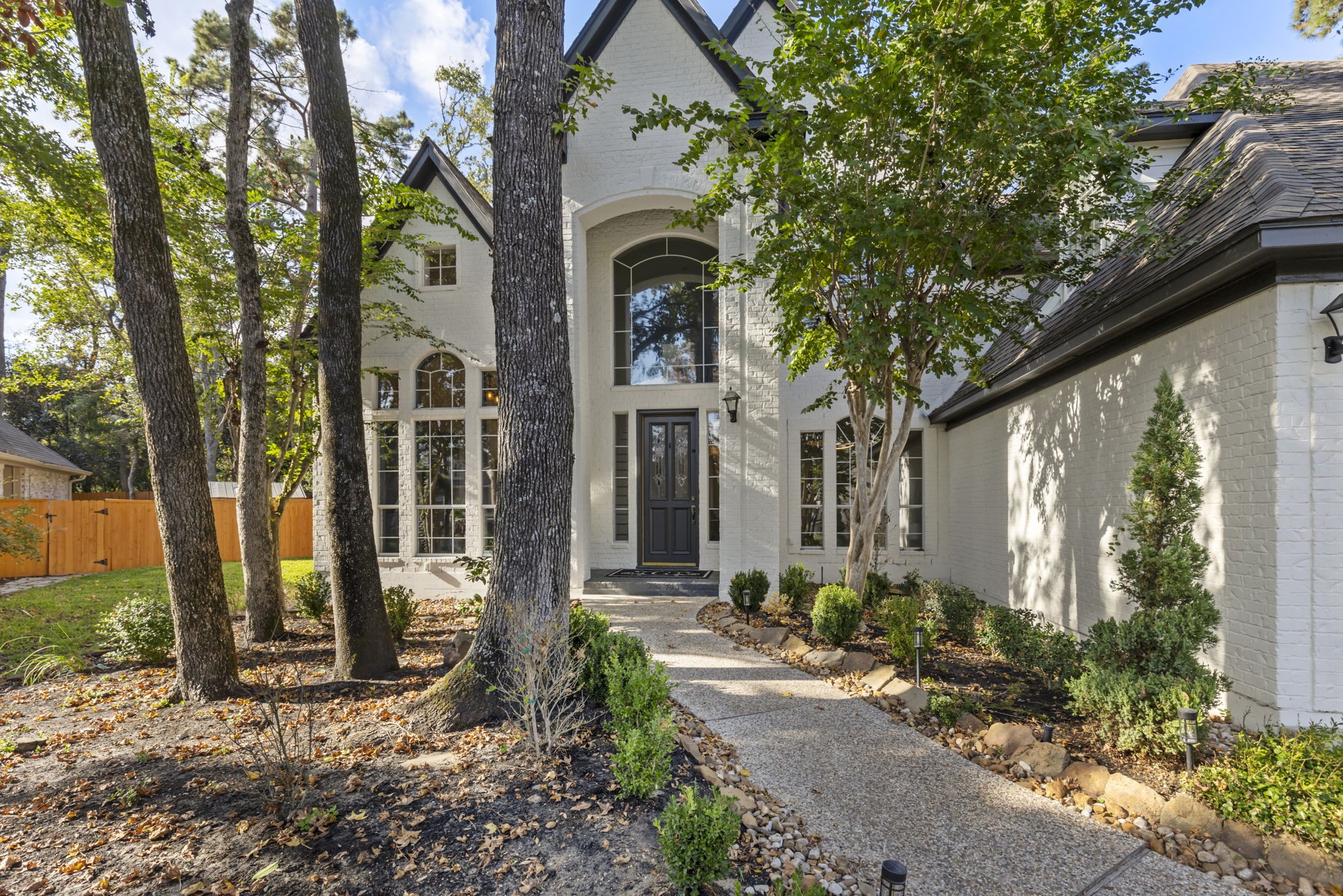 Recently painted brick exterior offers an elegantly modern appeal.