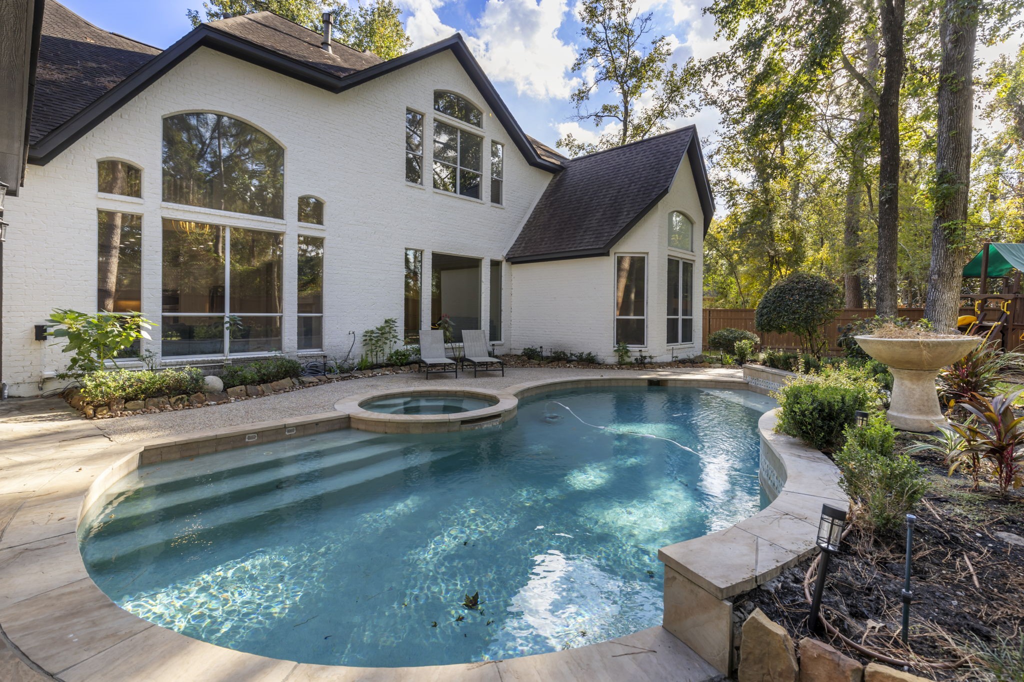 Enjoy a sparkling pool and spa, perfect for relaxation and gatherings, along with a spacious backyard ideal for outdoor activities!