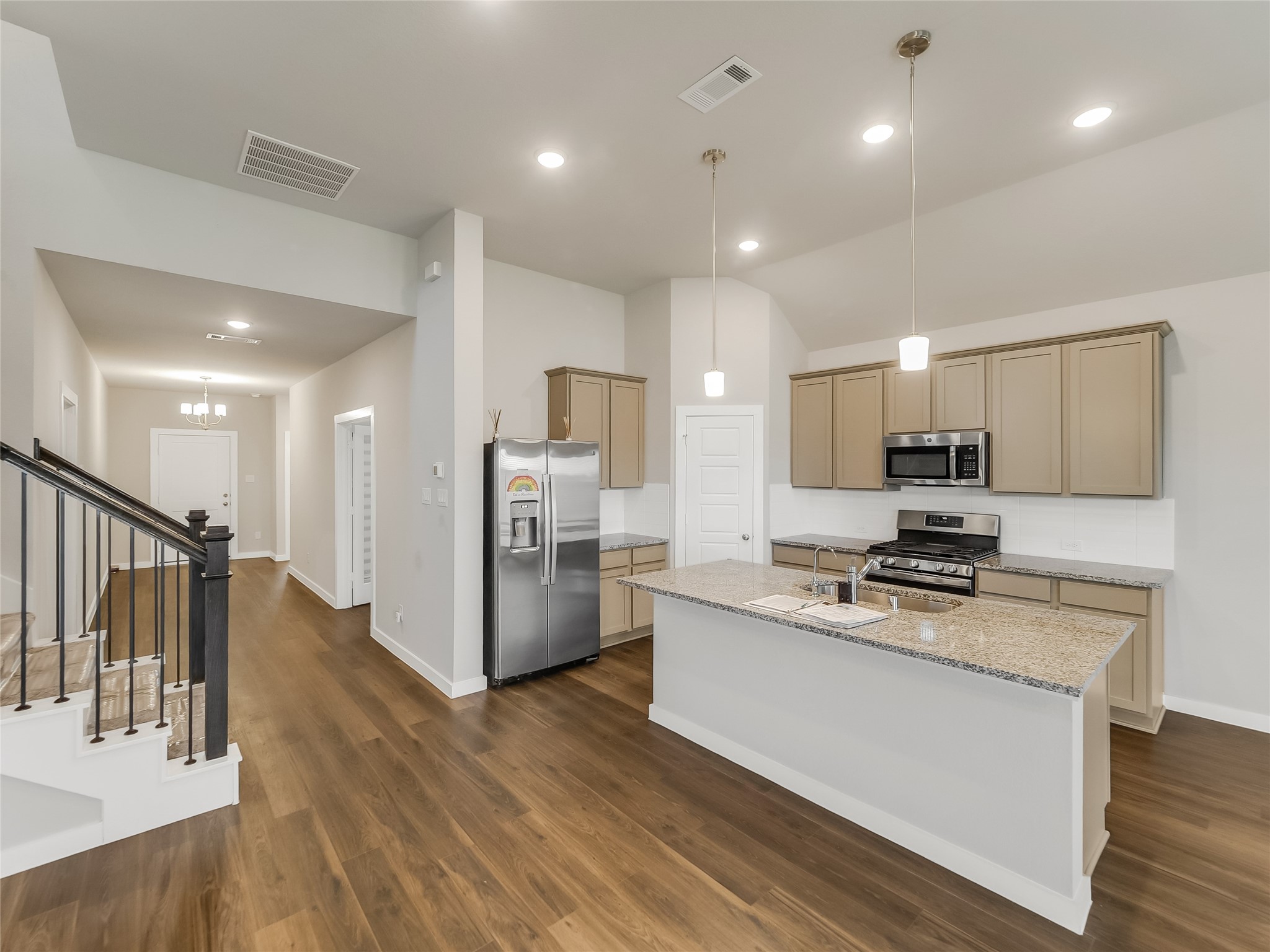 Entry leads into the kitchen first
