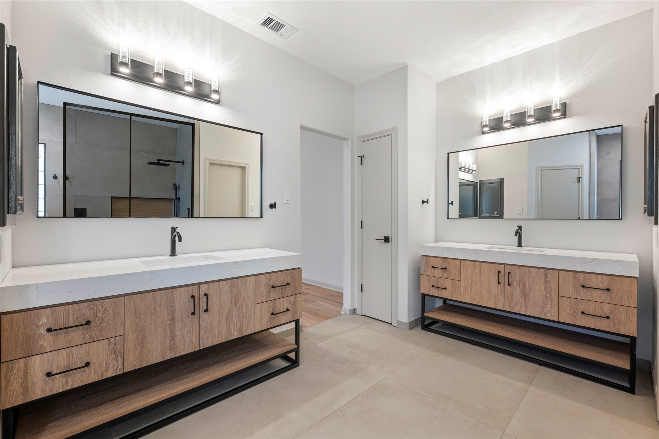 Double sinks and lots of cabinets