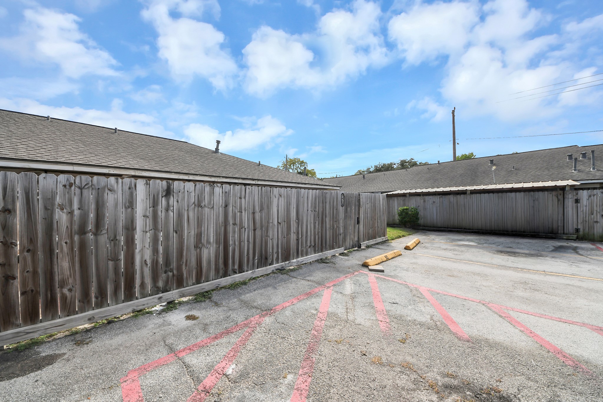 Designated parking is behind the unit.