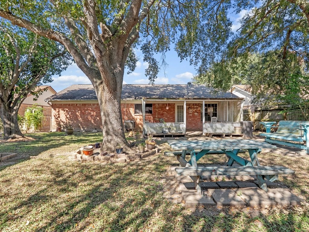 Back of Home and fenced backyard