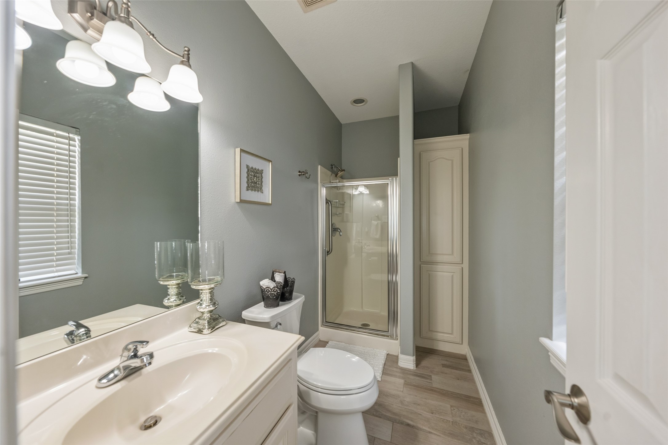 Full Bath located near back of home. ( easy access from pool)