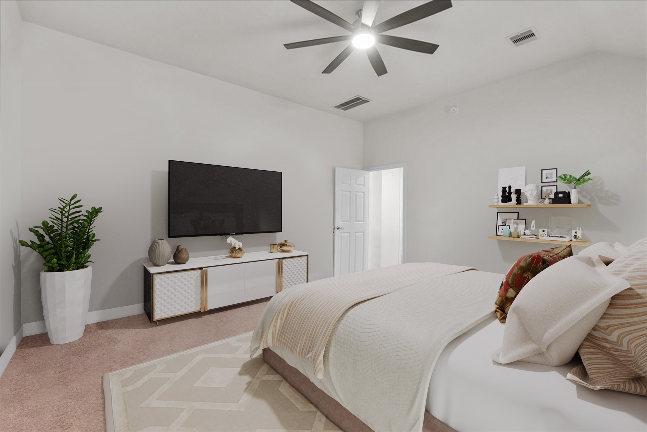 The primary bedroom boasts a private en-suite bath