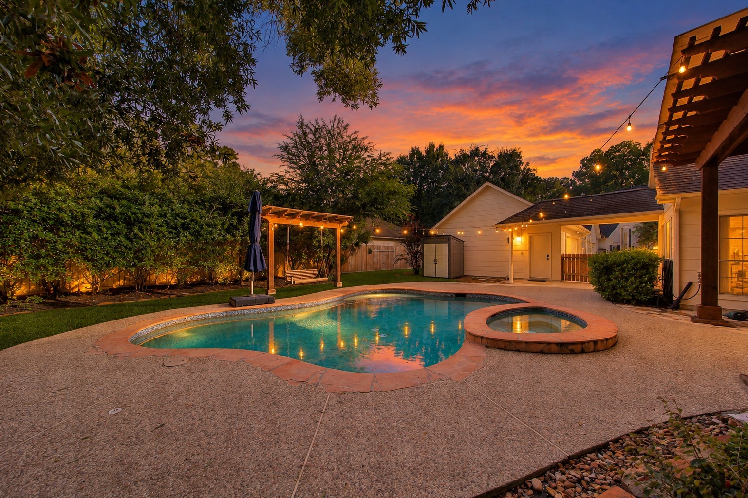 Large pool and spa with lagoon style color finish and Pebble Tec for durability. Photo has been digitally altered using generative ai for virtual staging. Buyer to verify all. Large pool and spa with lagoon style color finish and Pebble Tec for durability. Photo has been digitally altered using generative ai for virtual staging. Buyer to verify all.