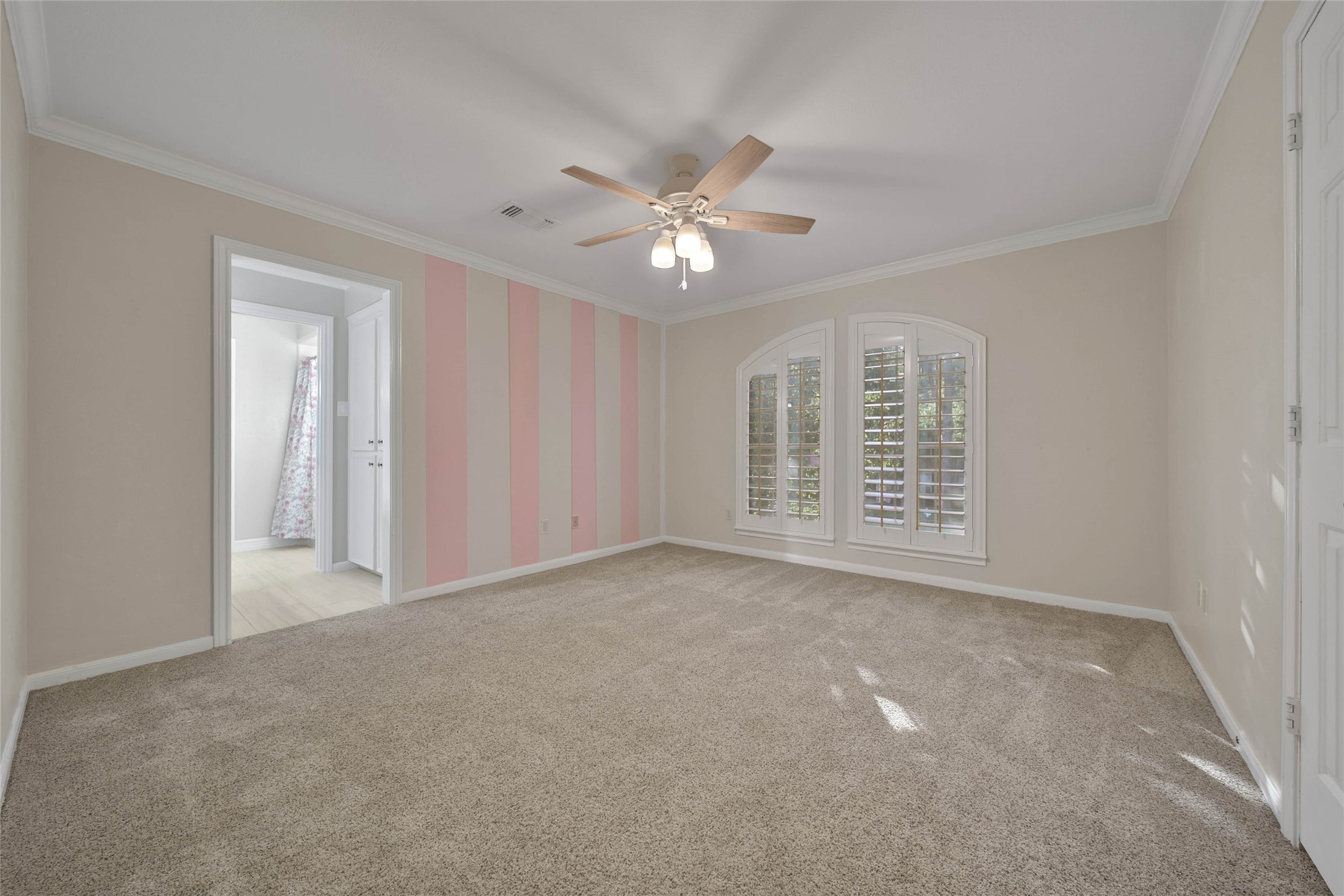 Upstairs bedrooms are spacious and feature large closets and every bedroom has access to a bath. Plantation shutters in all the bedrooms.