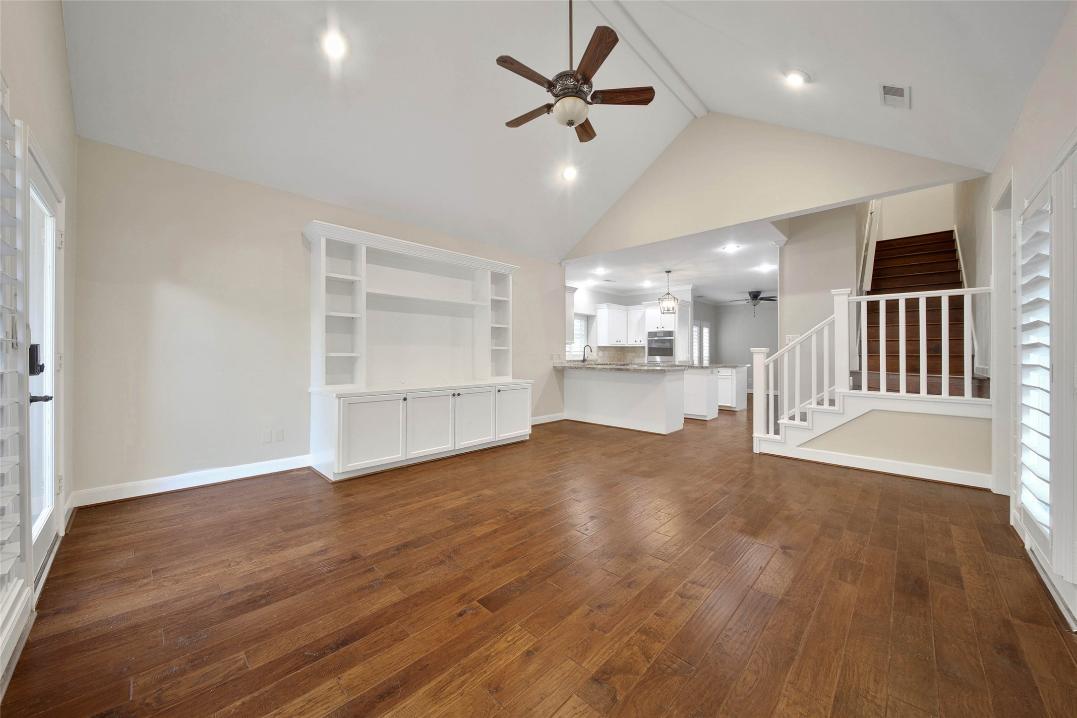The Den is located off the kitchen and has a large built-in for your entertaining needs. Bright windows of the pool, patio and backyard surround this room. Vaulted ceiling adds to the spacious feel.