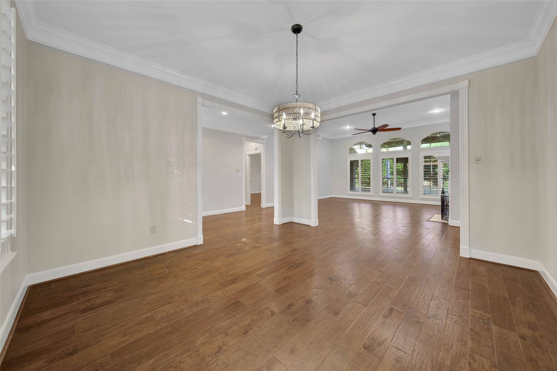The dining room is its own separate space but still feels open and flows through to the living room, perfect for entertaining guests or hosting large gatherings!