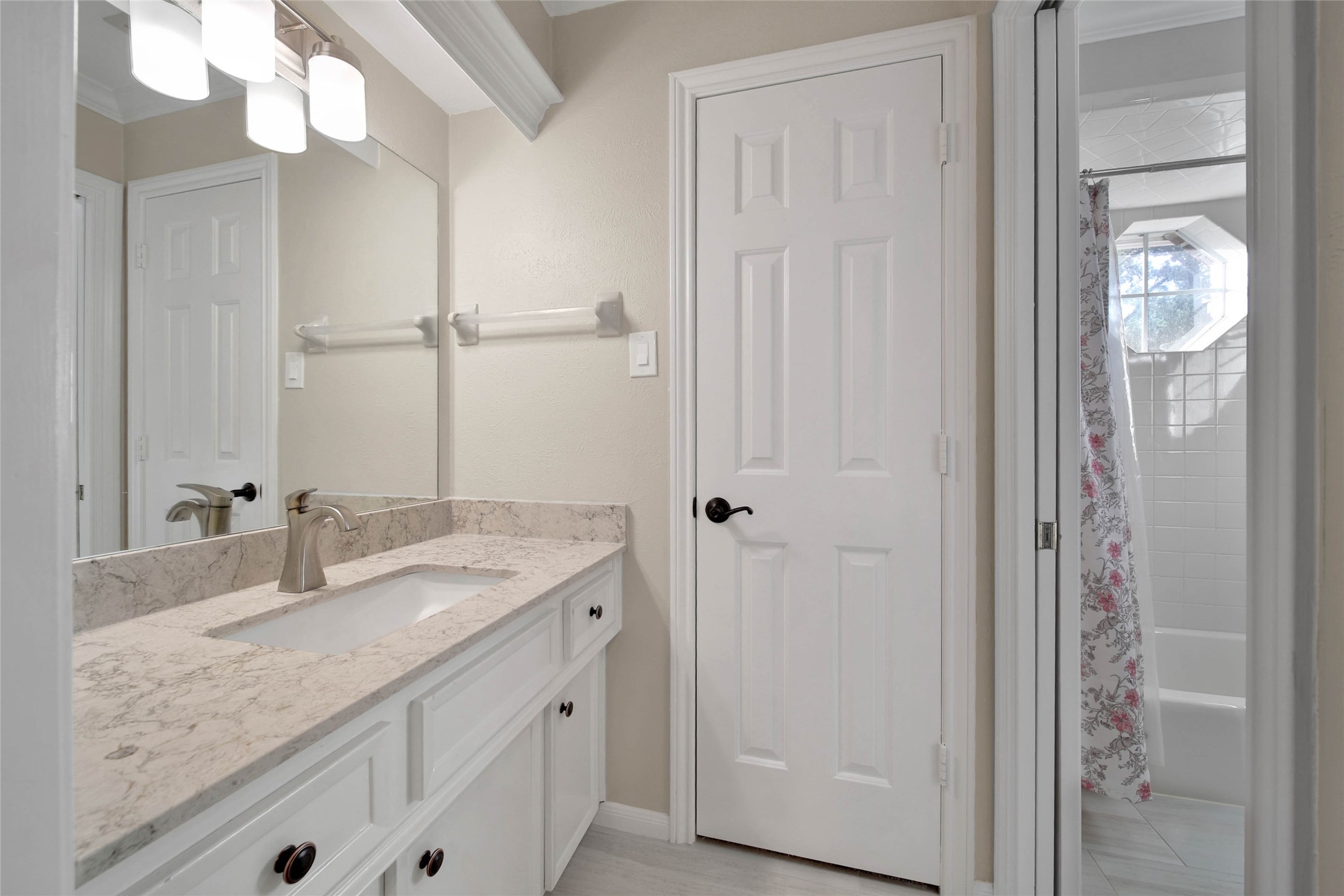 Upstairs features two Hollywood baths! Updated vanities with granite countertops and huge closets. So much storage!