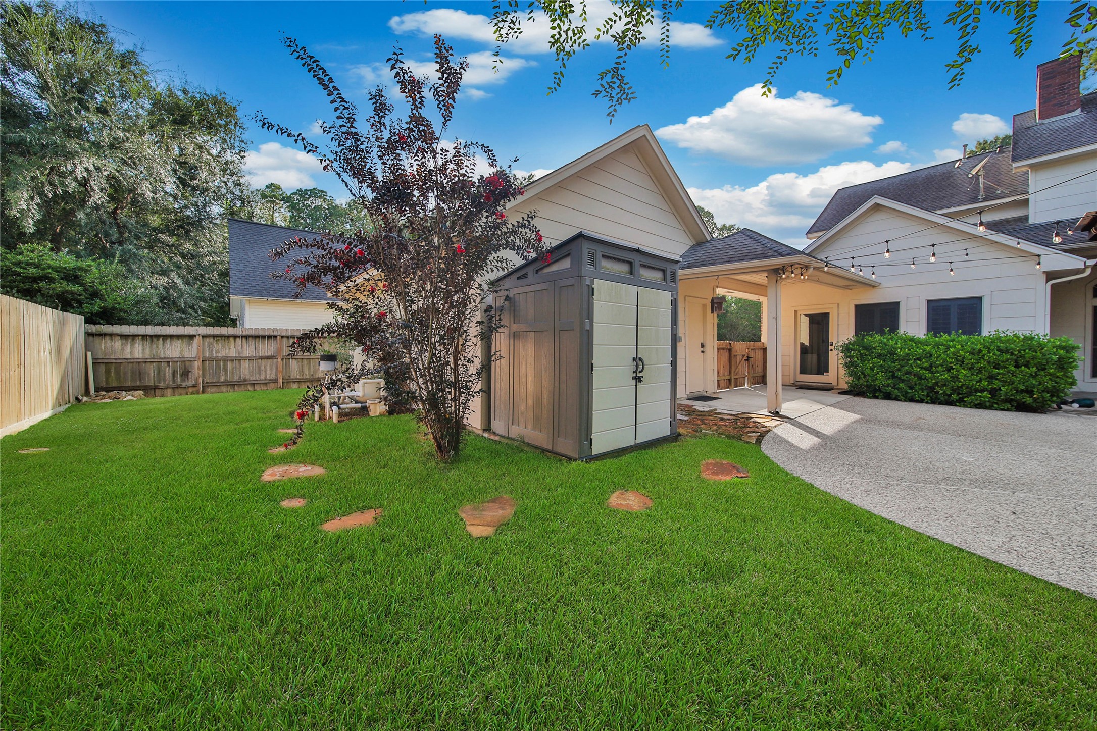 Lots of yard space behind the garage. A storage shed is already in place for you!