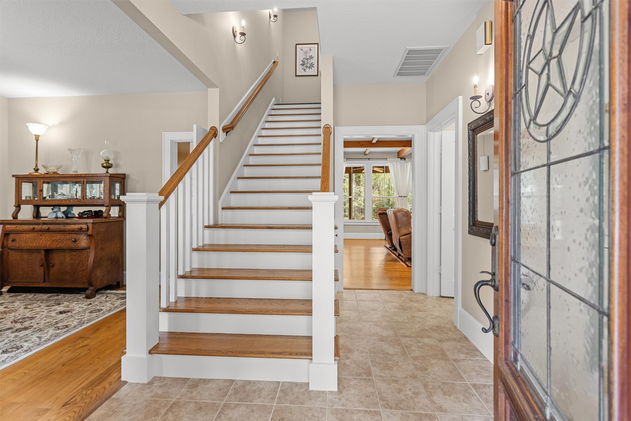 Bright entry with a staircase and natural light Bright entry with a staircase and natural light