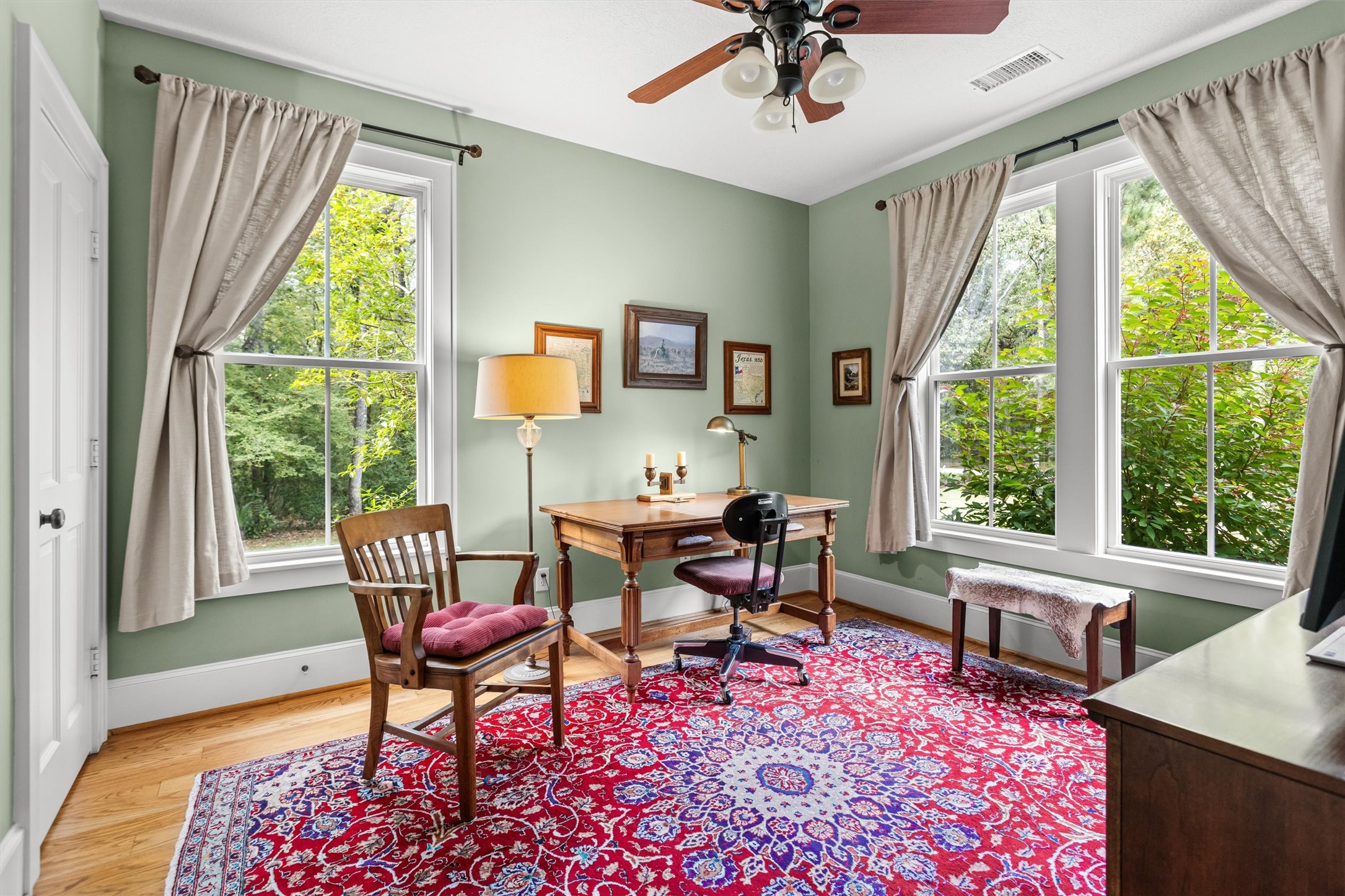 Downstairs room that works as an office or a guest space