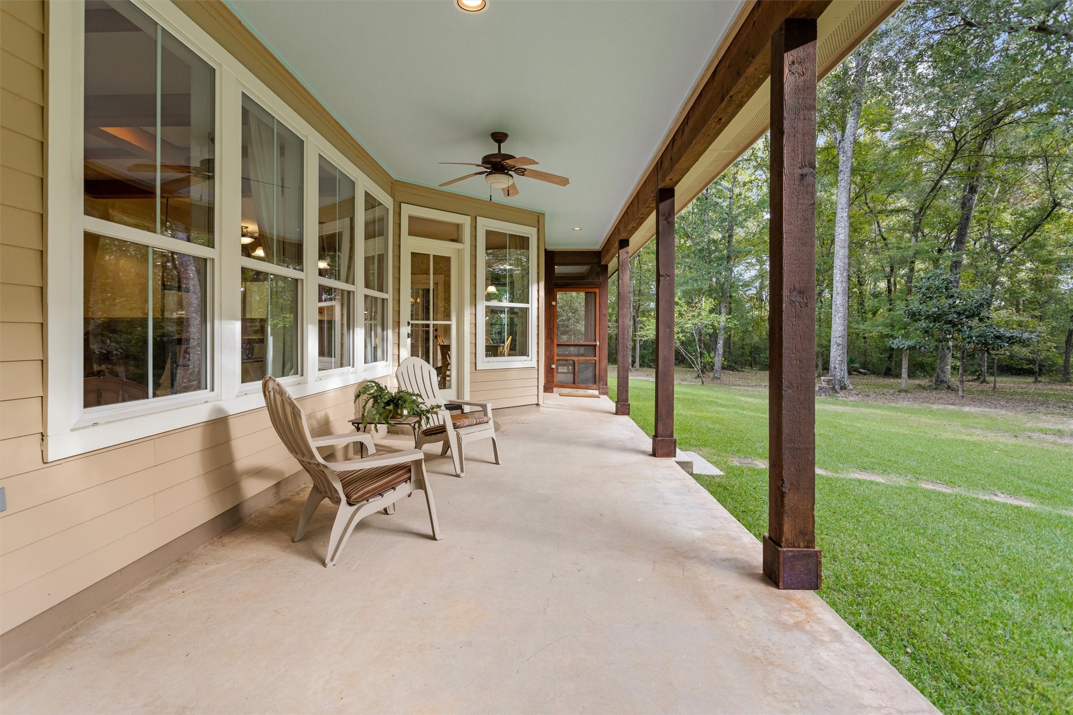 Long covered porch overlooking the property