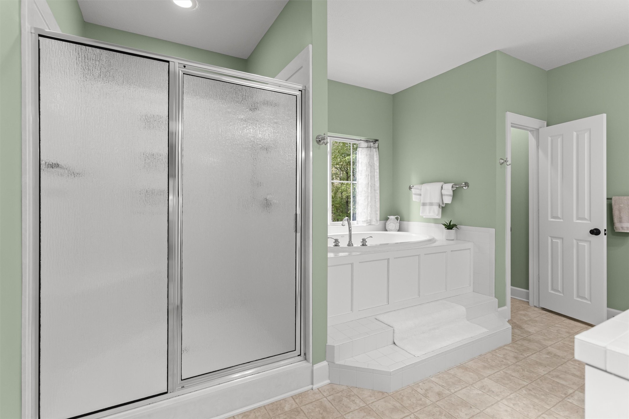 Primary bath with a soaking tub and separate shower