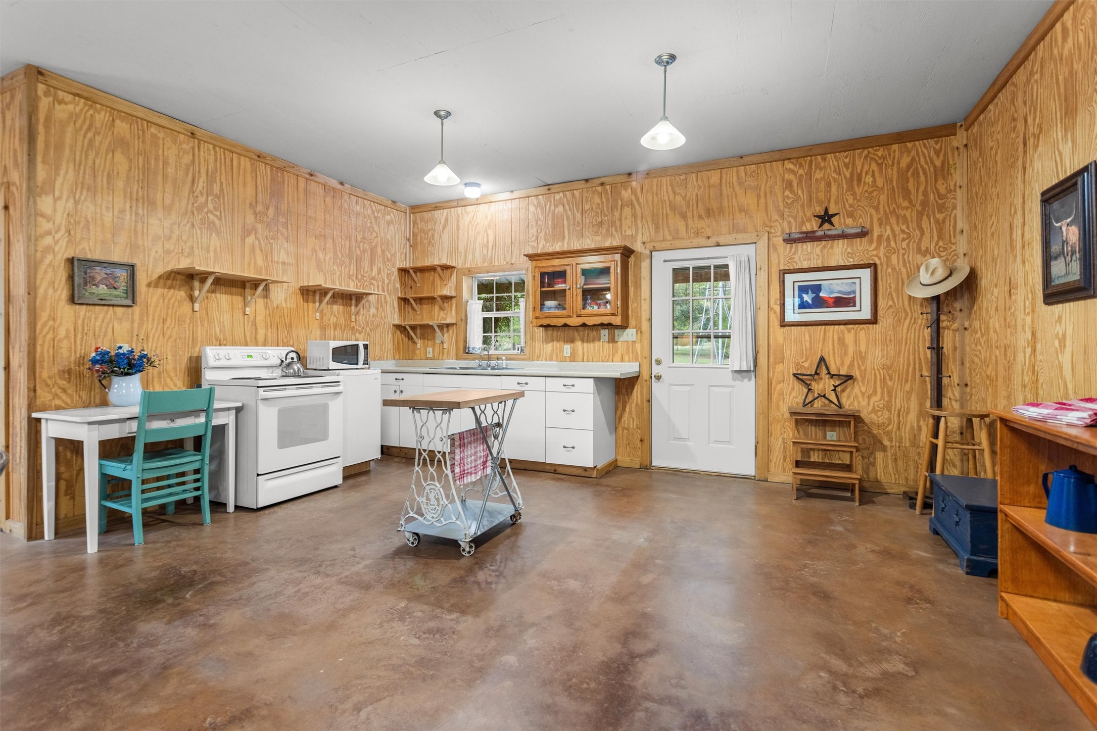 Guest quarters kitchen with appliances.