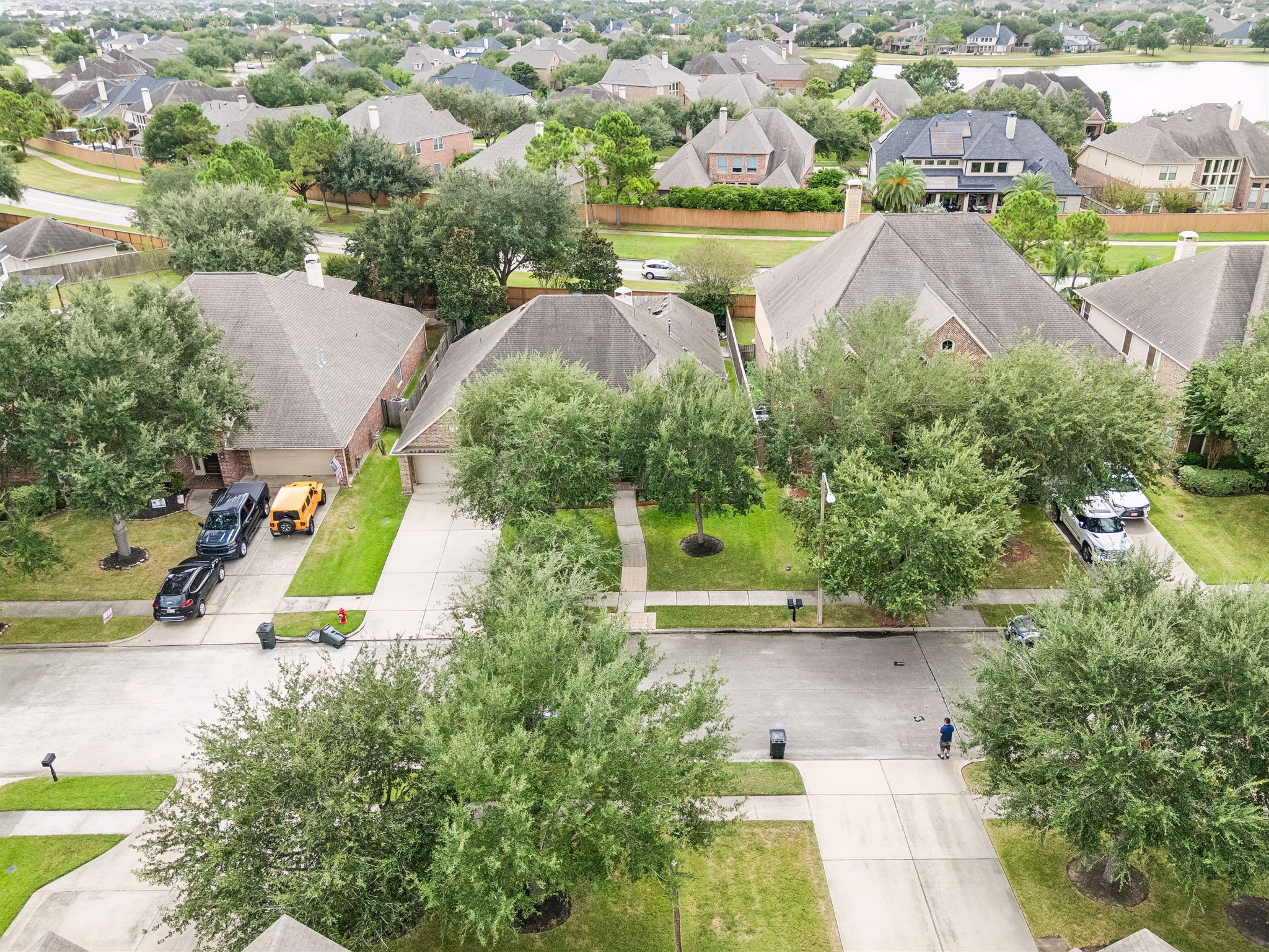 Additional aerial perspective showing the propertys setting within the surrounding neighborhood.