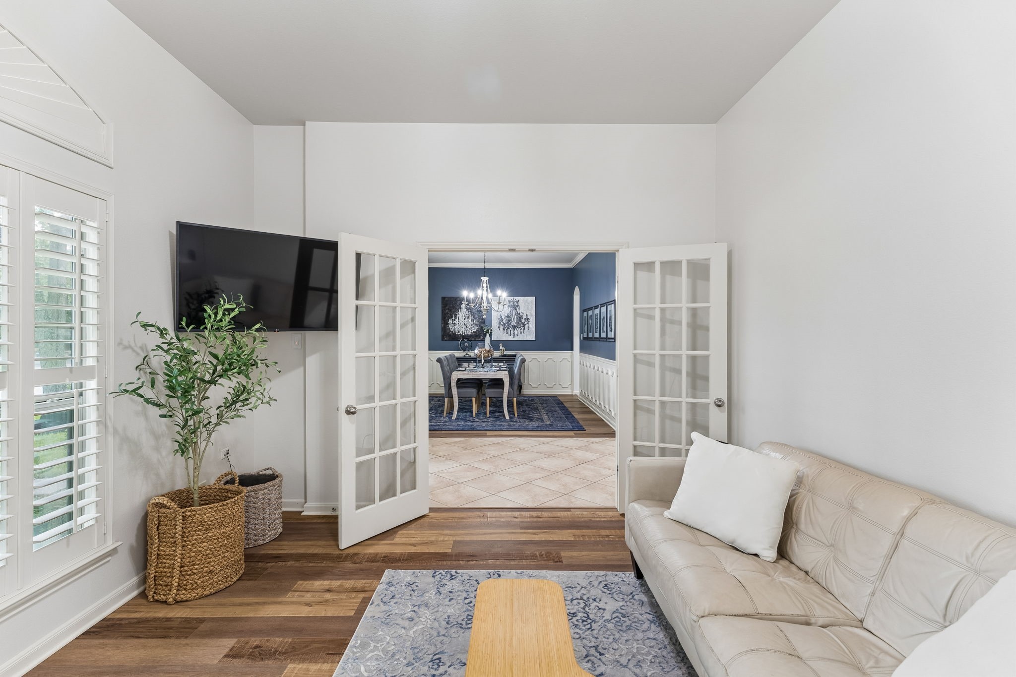 Alternate view of the living space highlighting the open feel and multiple windows.
