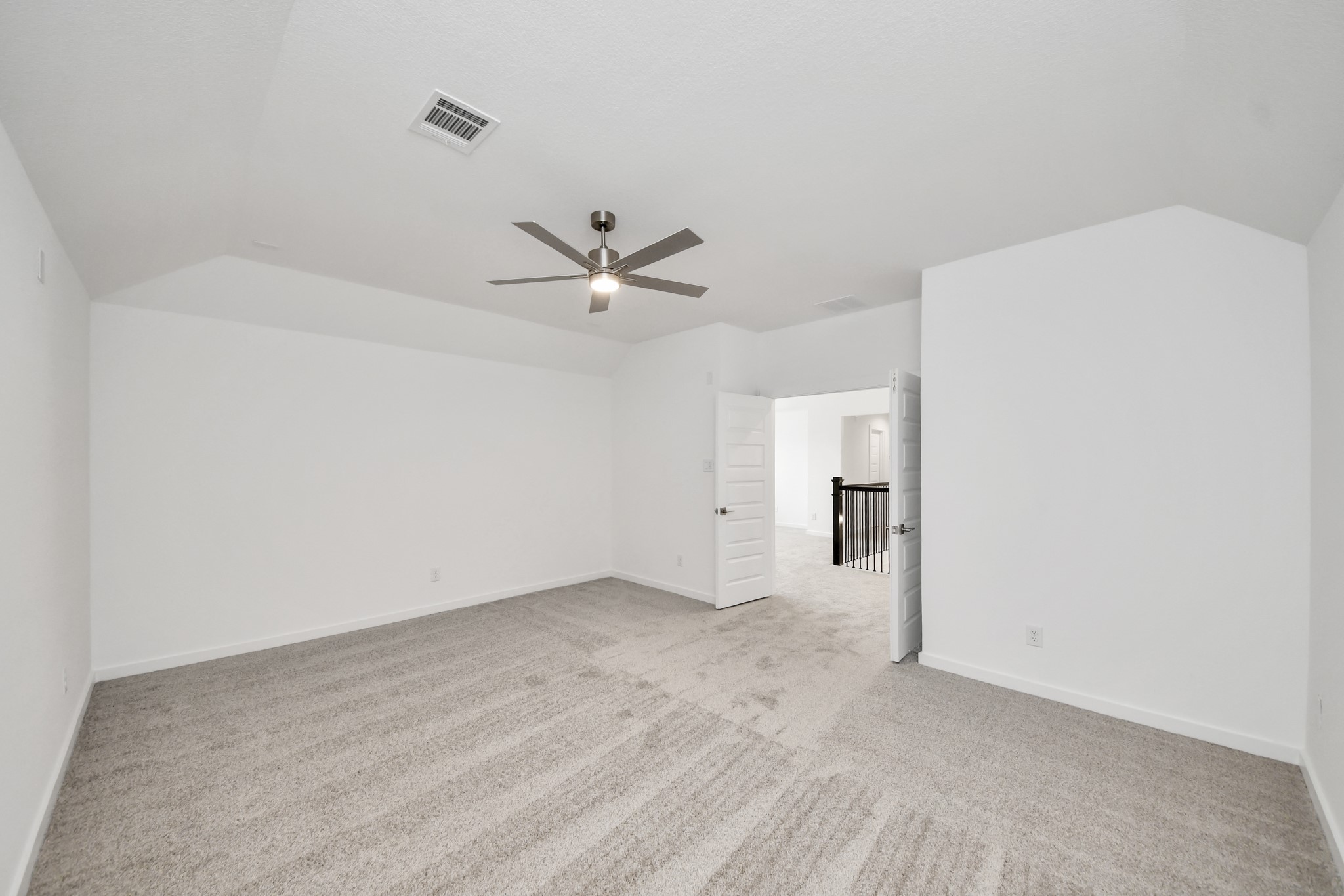 Take a look at this expansive media room. Sample photo of completed home with similar floor plan. Actual colors and selections may vary.