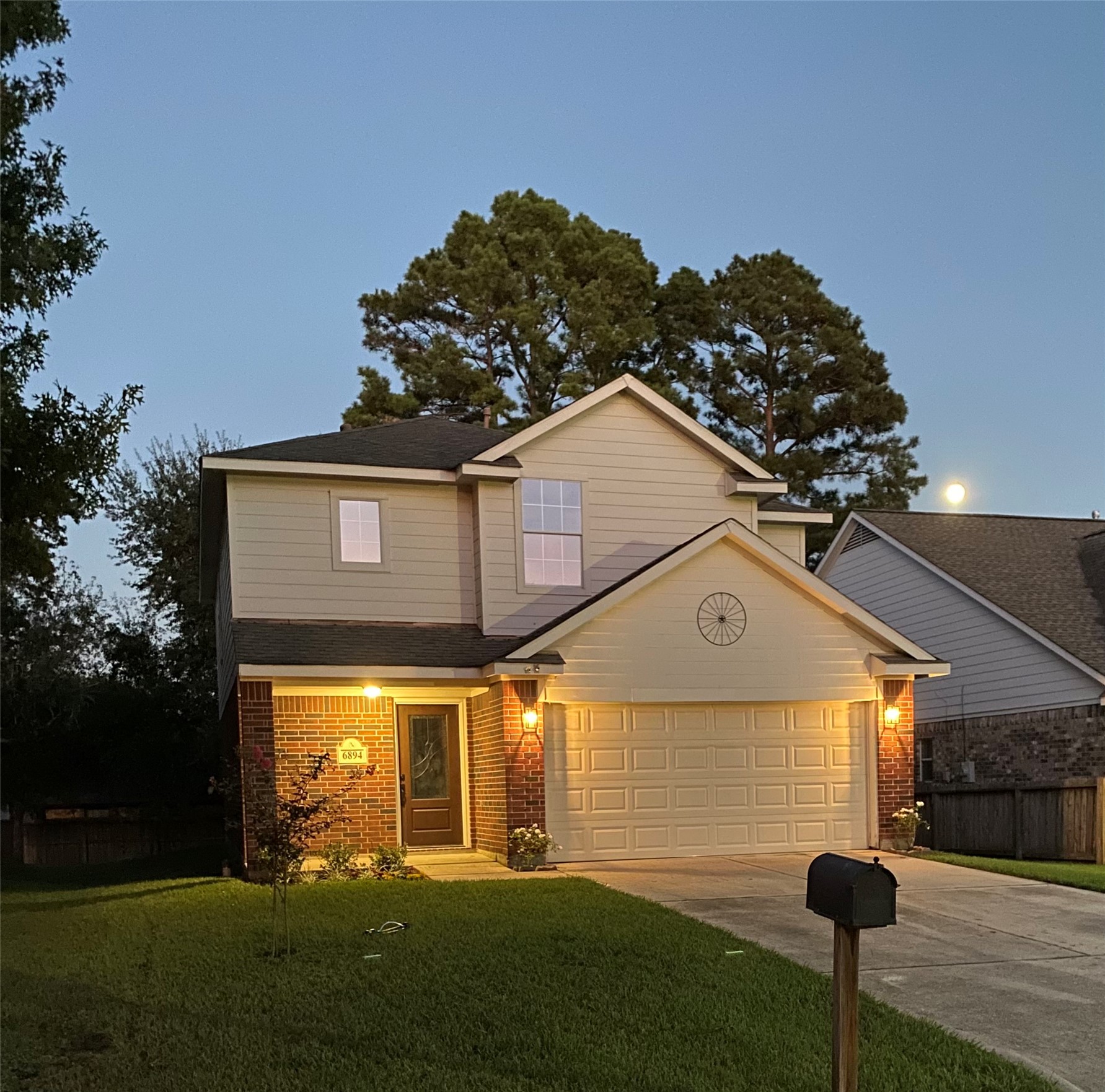 Classic curb appeal from day to evening. For a closer look, schedule your showing today!