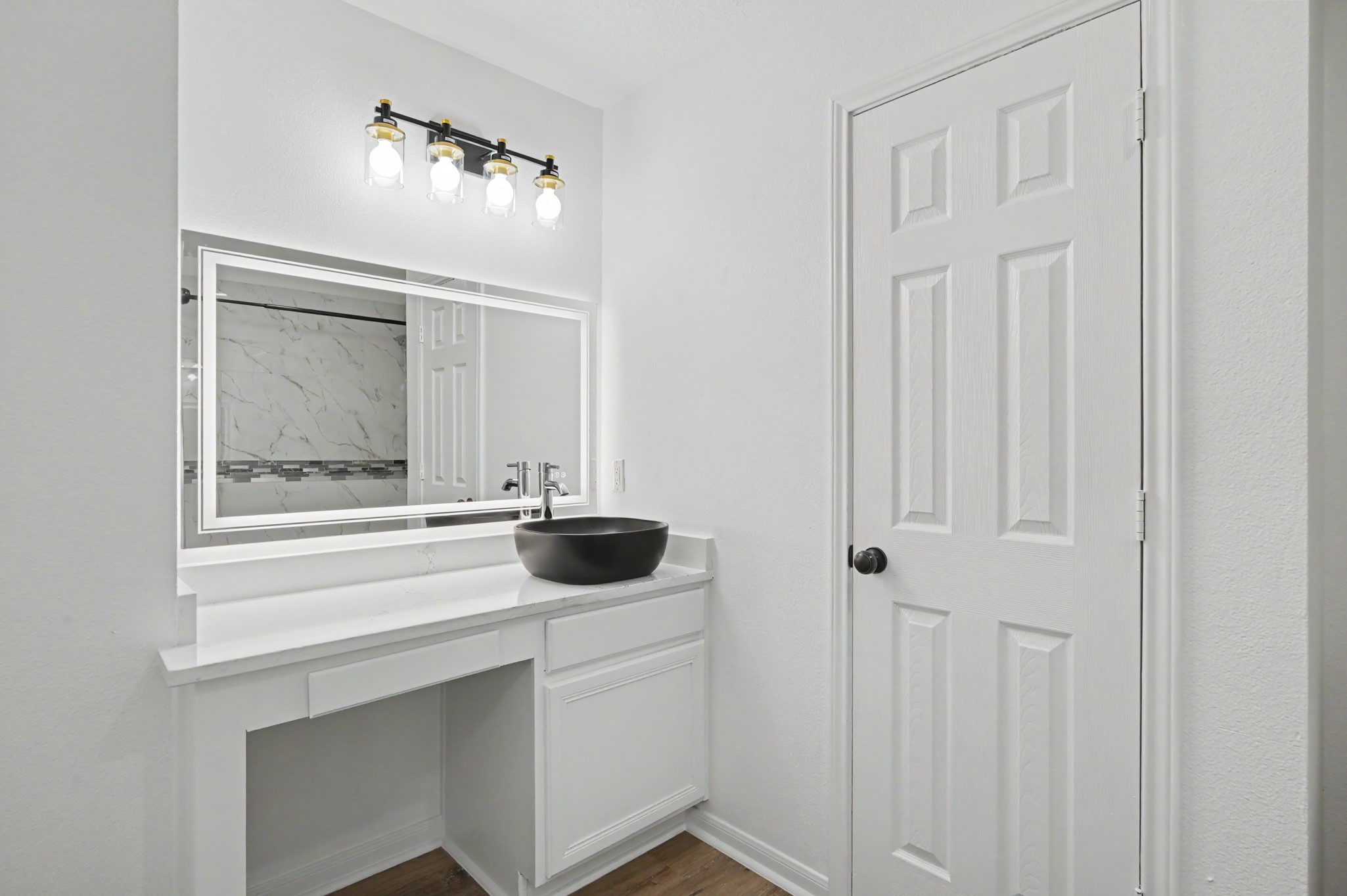 Modern vanity in primary bathroom