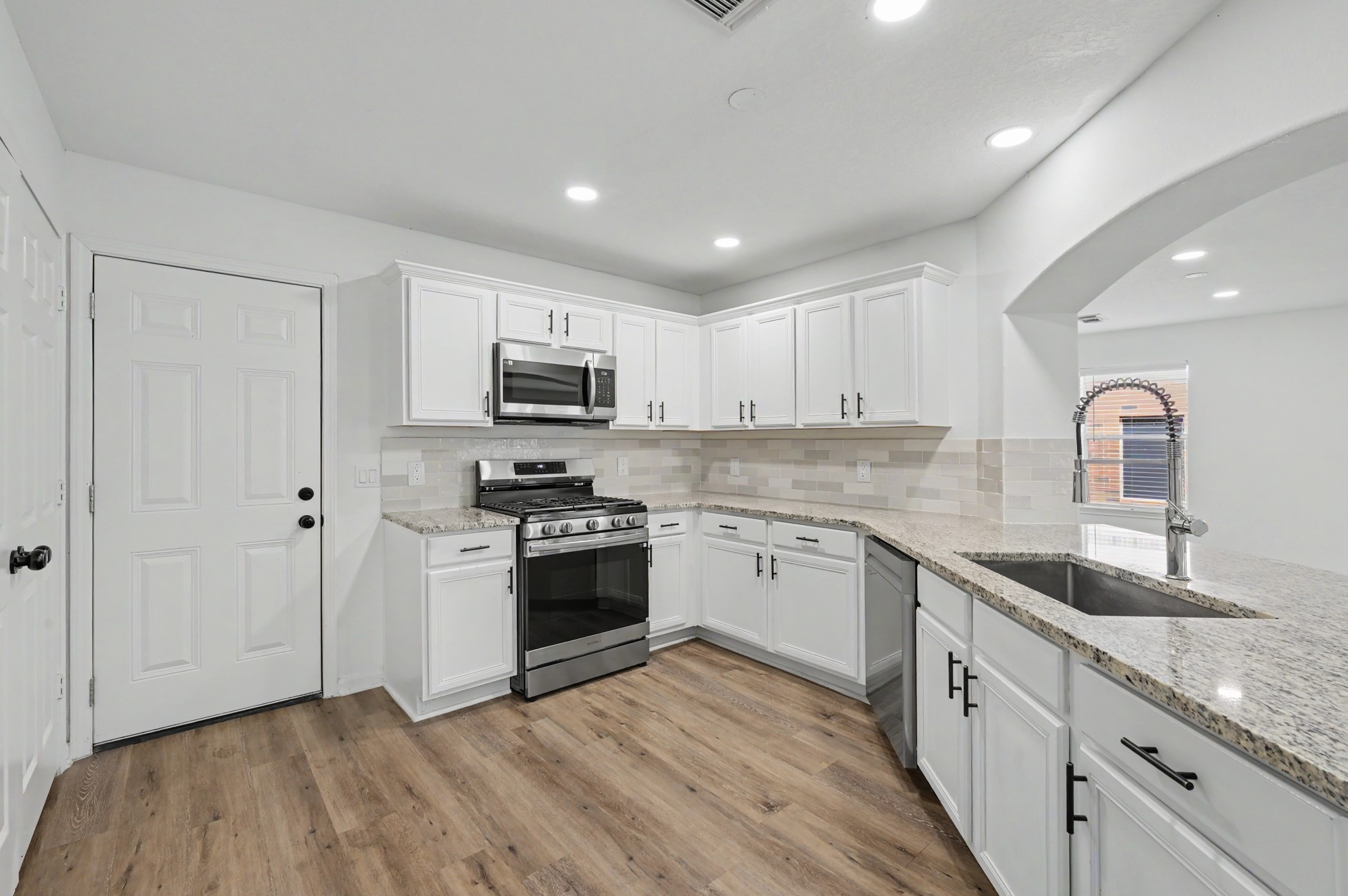 Modern kitchen with granite countertops
