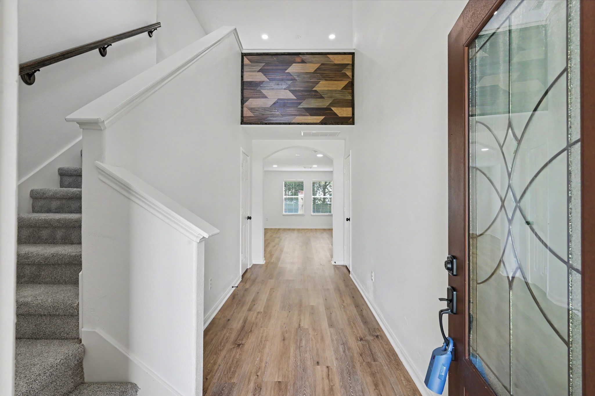 Elegant entry with high ceiling