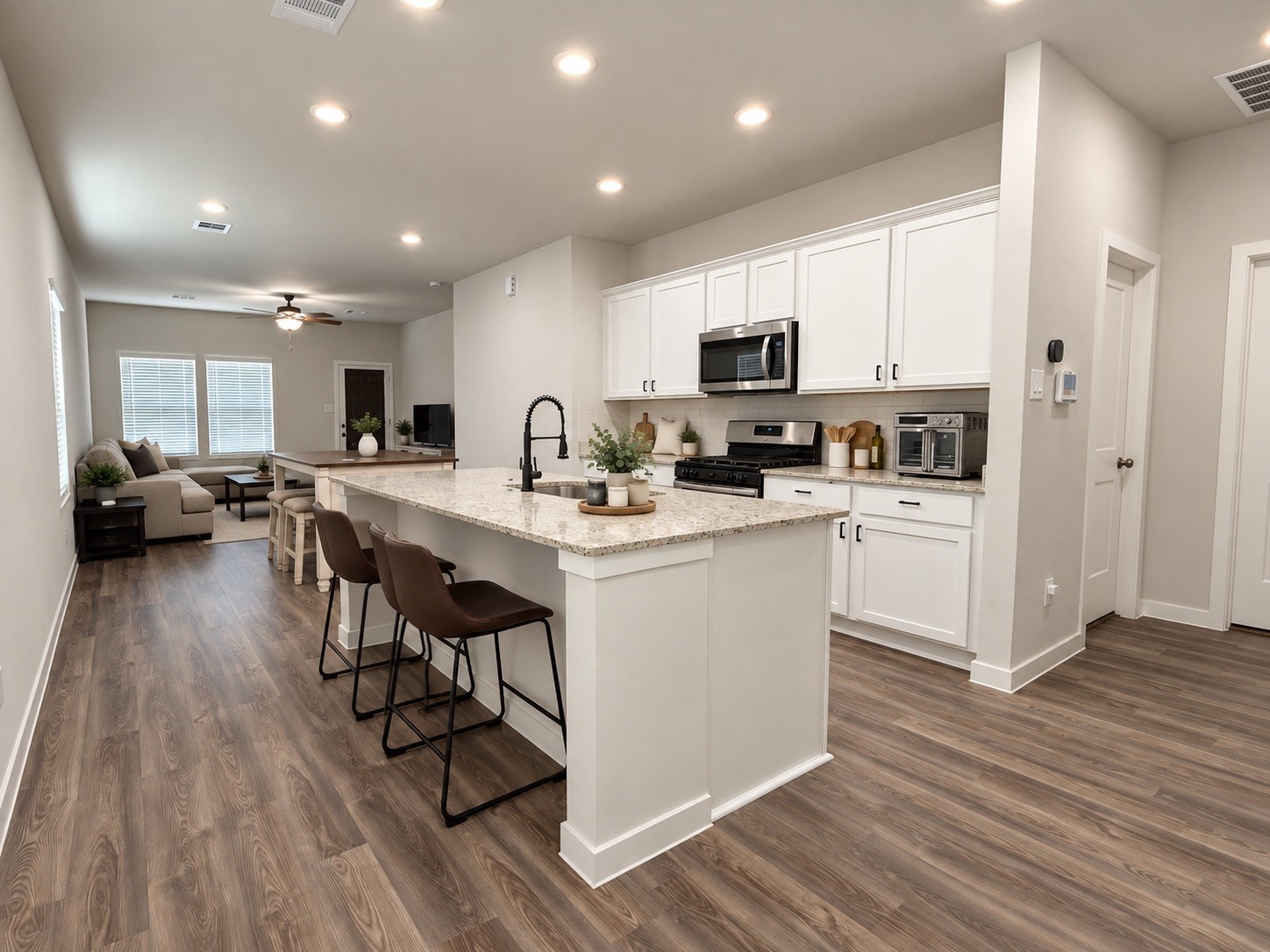 Open-Concept Kitchen and Living Area with Large Island Open-Concept Kitchen and Living Area with Large Island
