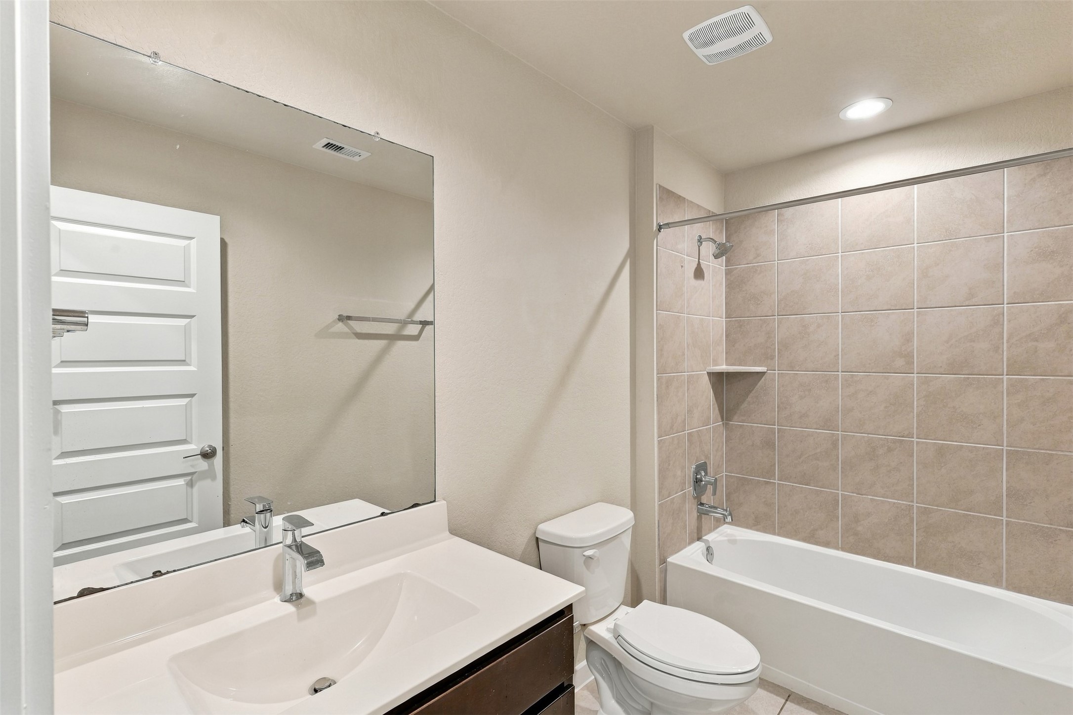 Guest Bathroom with Tub and Shower Combination!