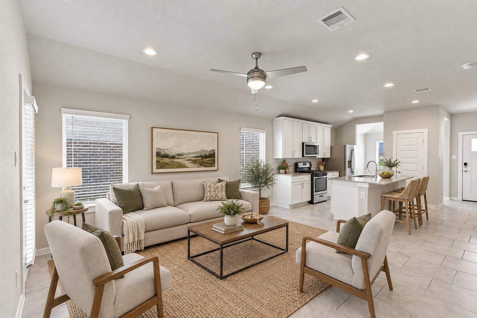 Family Area flows gently into the Dramatic Gourmet Kitchen that features Beautiful Quartz Countertops, Large Eat in Island, Deep Undermount Sink, Pull Out Swan Kitchen Faucet!   Make that call today! *Photo is Virtually Staged*