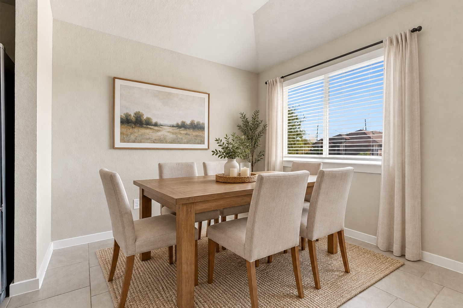 Wonderful Casual Dining Area with Large Beautiful Tile Floors laid in an Upgraded Pattern!  Direct Entry into the Gourmet Kitchen making serving a snap! *Photo is Virtually Staged*