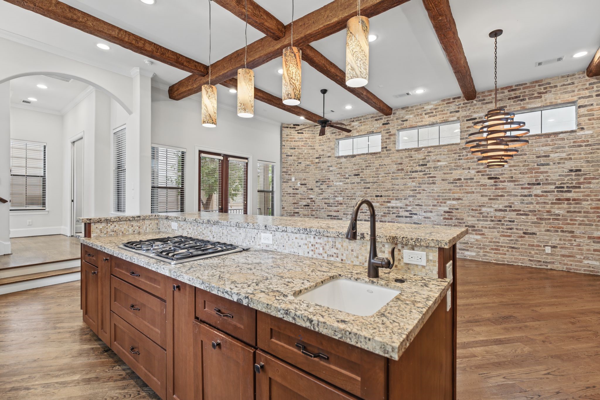 Kitchen | Island Prep Sink  Second Floor  Thoughtfully integrated into the generous kitchen island, a secondary prep sink adds convenience and versatility, making meal preparation effortless.