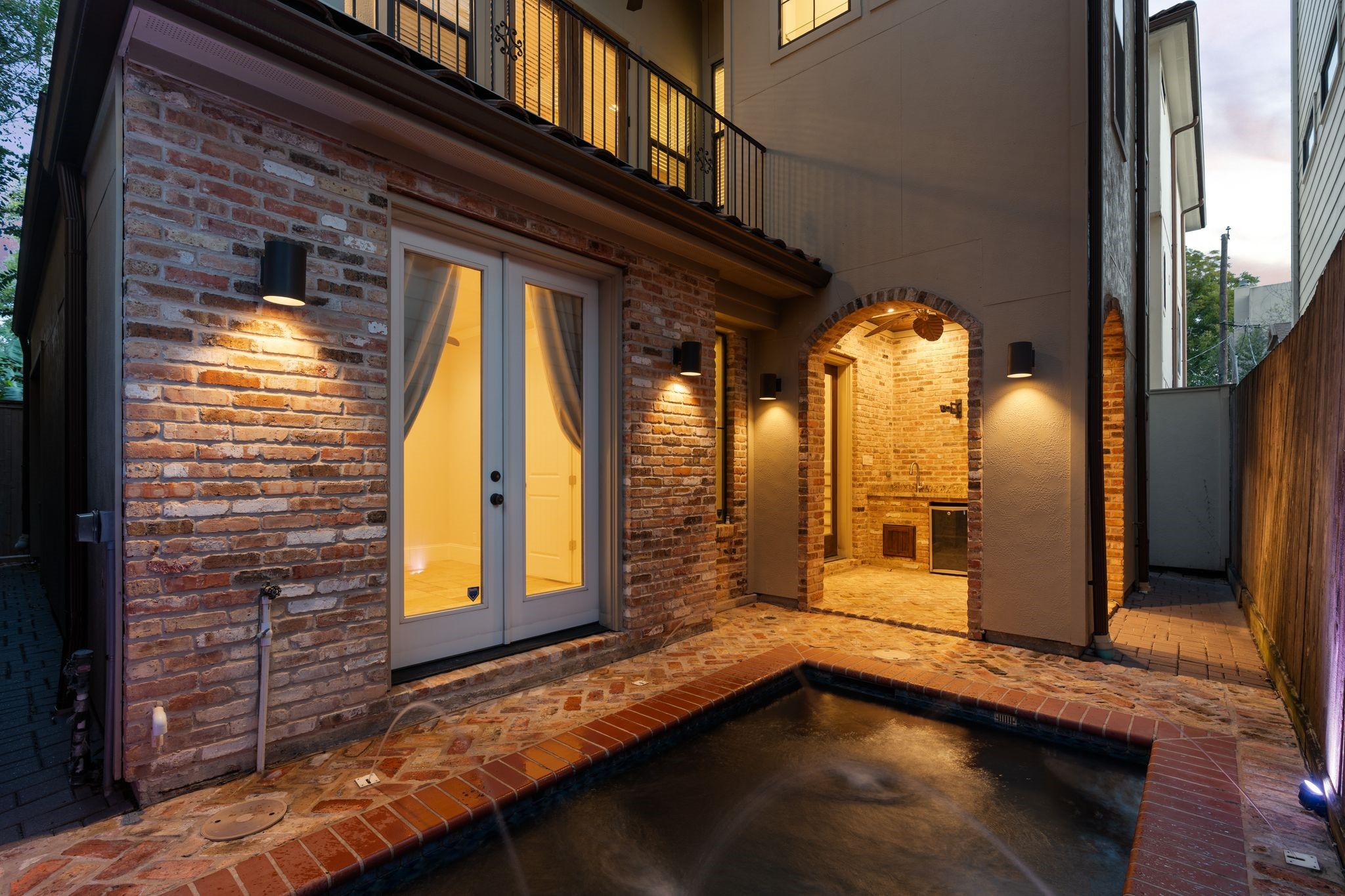 Private Plunge Pool | Outdoor Living  A little slice of Mediterranean living in the middle of Houston. Whether enjoying a refreshing evening dip or gathering with friends around the adjoining summer kitchen, this intimate outdoor retreat makes every day feel a little more like a getaway.