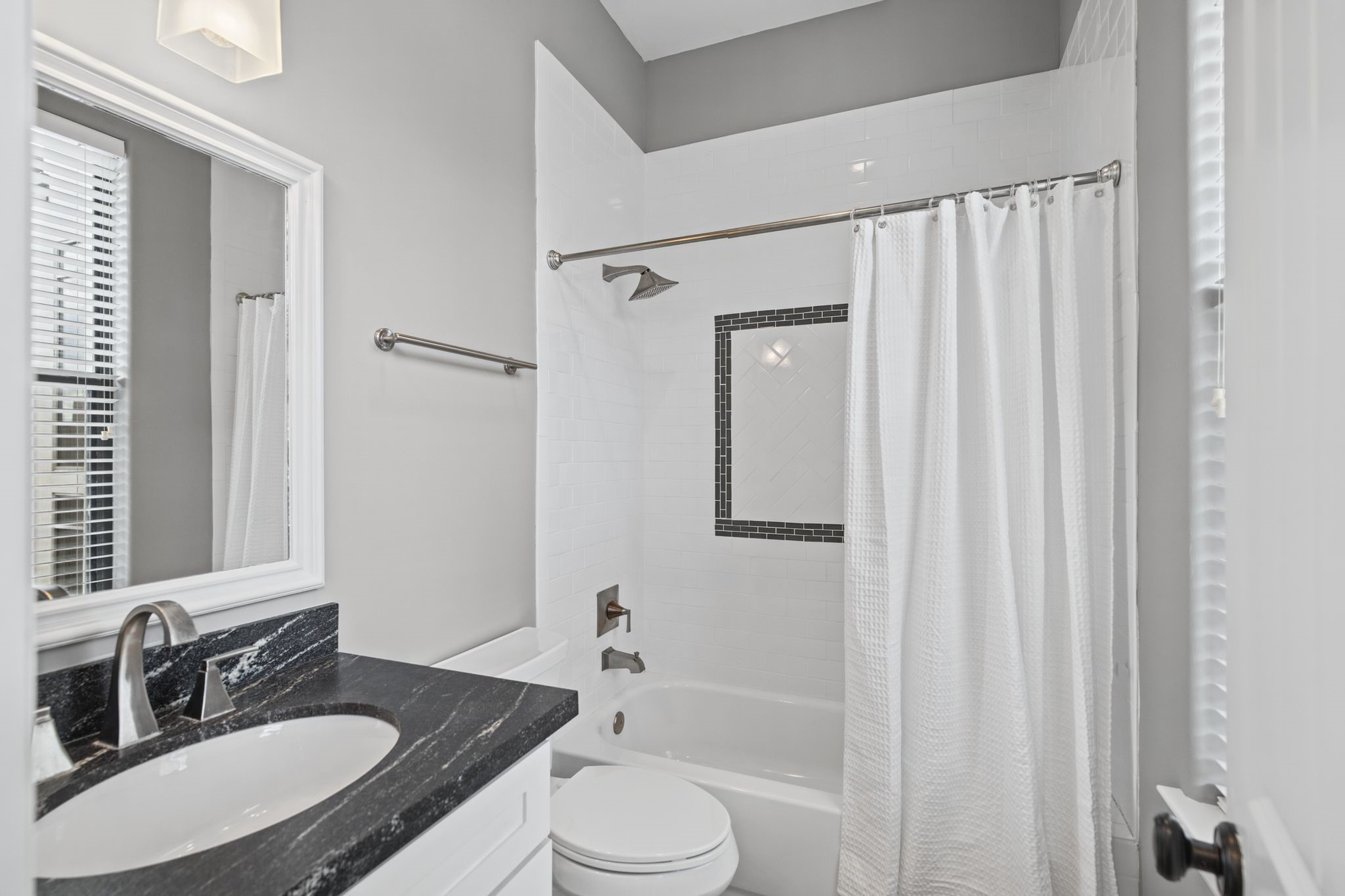 Secondary Bathroom [7 x 5]  Third Floor. Conveniently positioned to serve the secondary bedroom, this full bathroom includes a tub/shower combo.