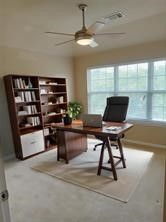 Virtually staged secondary bedroom showing potential as a home office